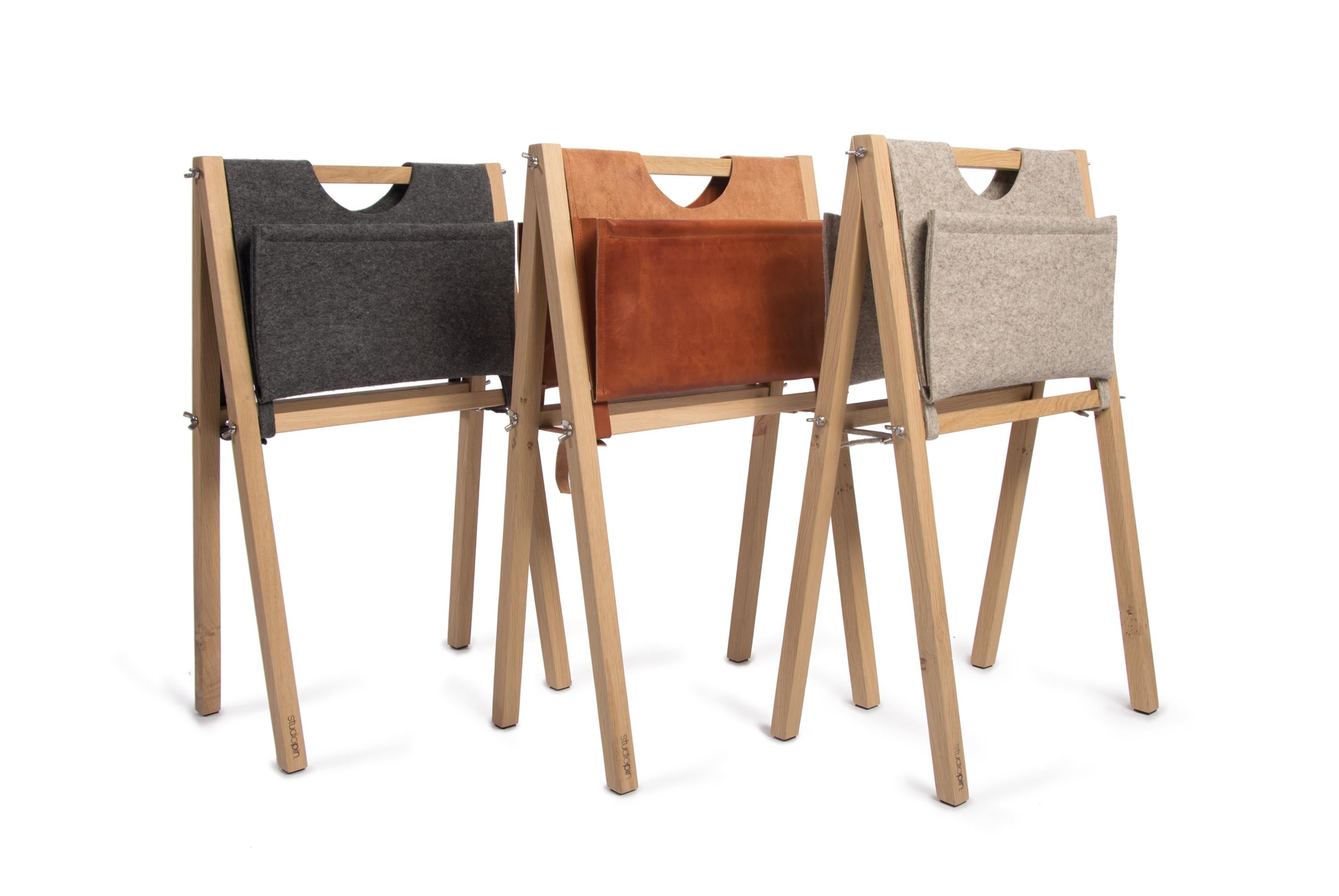 Light brown Stan magazine rack by Studio Pin
Dimensions: W 42 x D 26 x H 67.2 cm
Materials: oak, wool felt.
Weight: 2.15 Kg.

Stan is a magazine rack. The oak frame perfectly matches the 3 types of bags in the colors light brown and dark grey