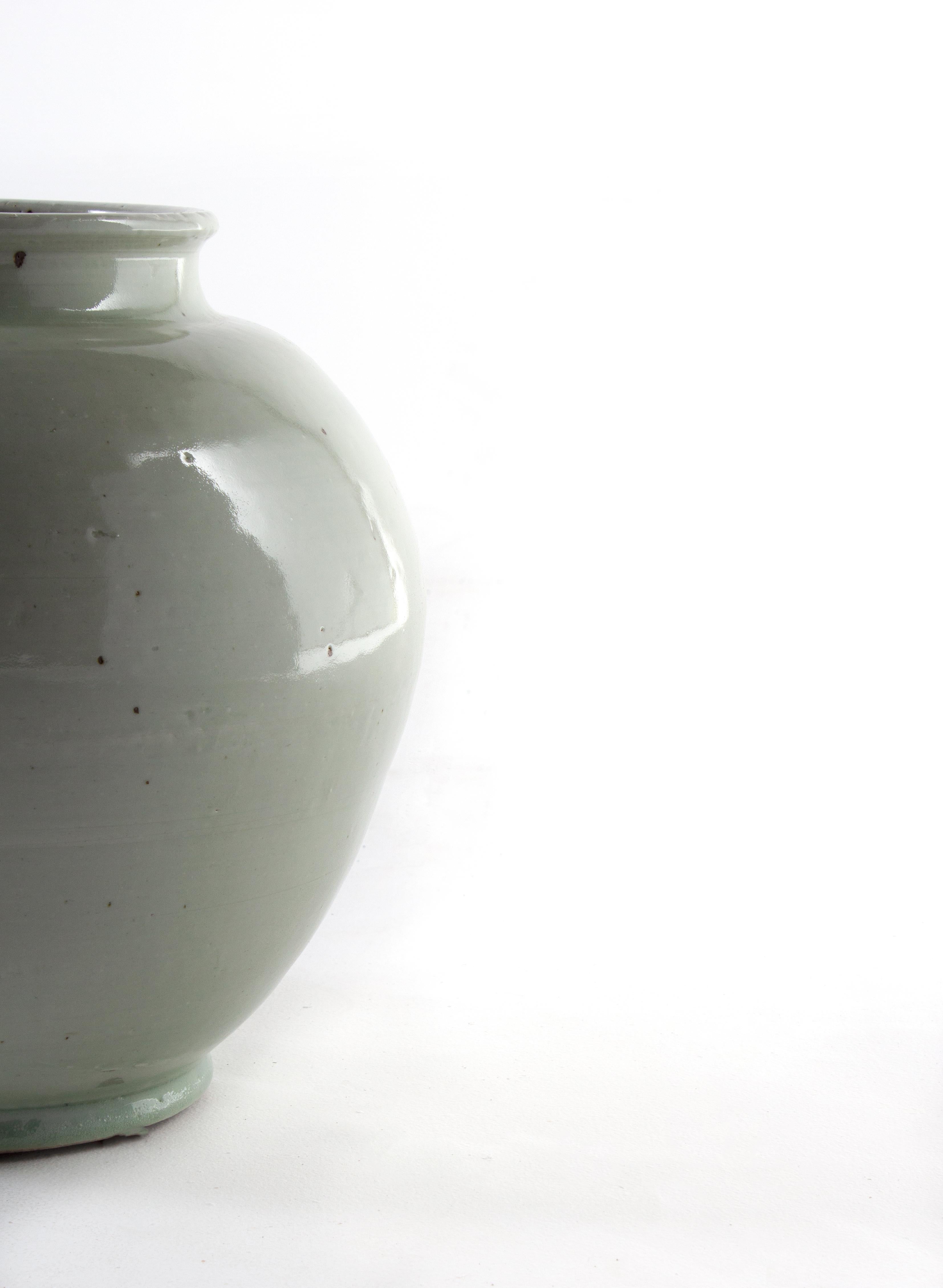 Light celadon crackle glaze Chinese vase.

This piece is a part of Brendan Bass’s one-of-a-kind collection, Le Monde. French for “The World”, the Le Monde collection is made up of rare and hard to find pieces curated by Brendan from estate sales,