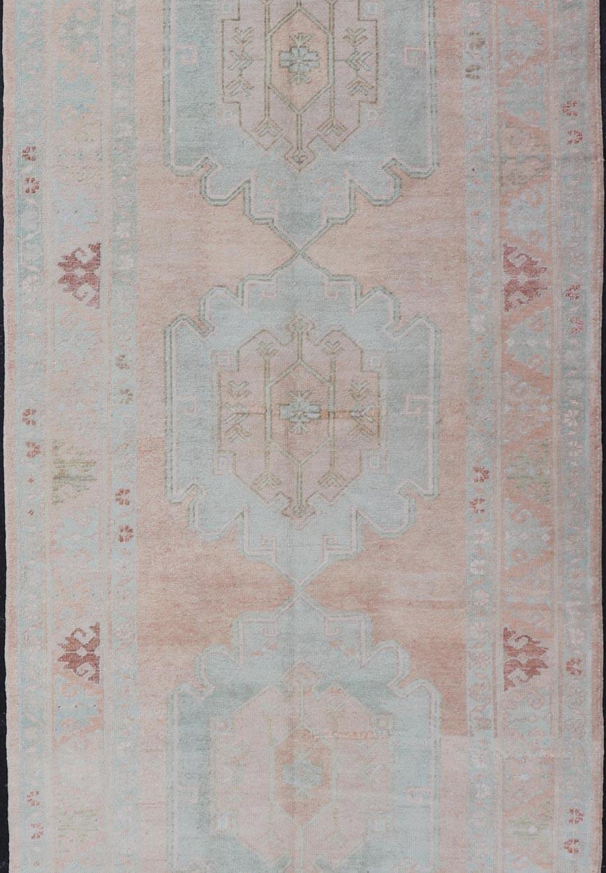 Persian Light Color Turkish Oushak Vintage Gallery Runner with Medallions For Sale