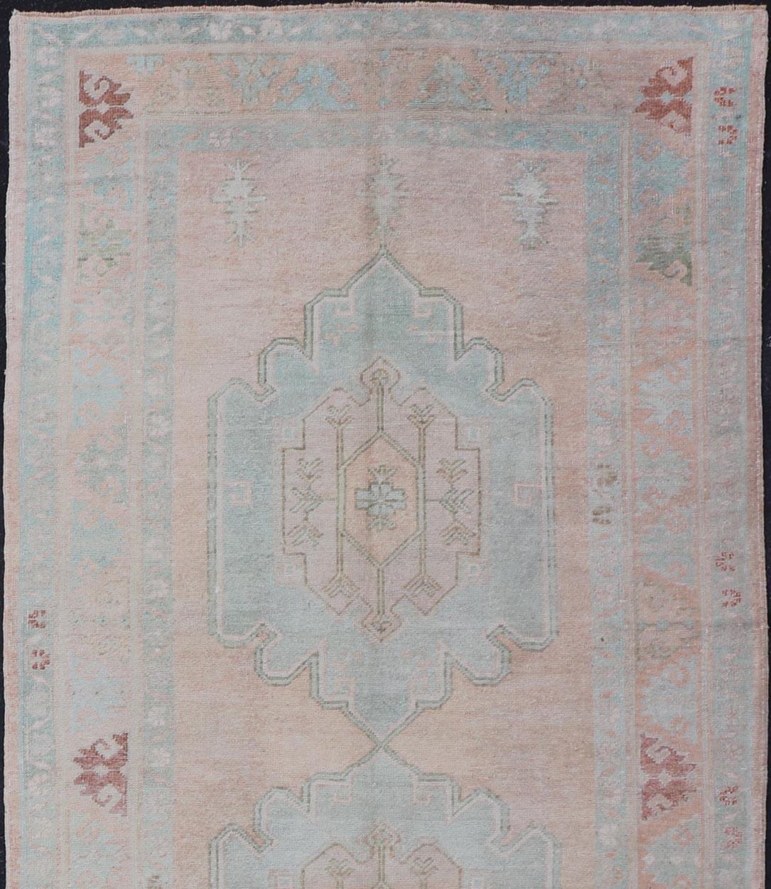 Hand-Knotted Light Color Turkish Oushak Vintage Gallery Runner with Medallions For Sale