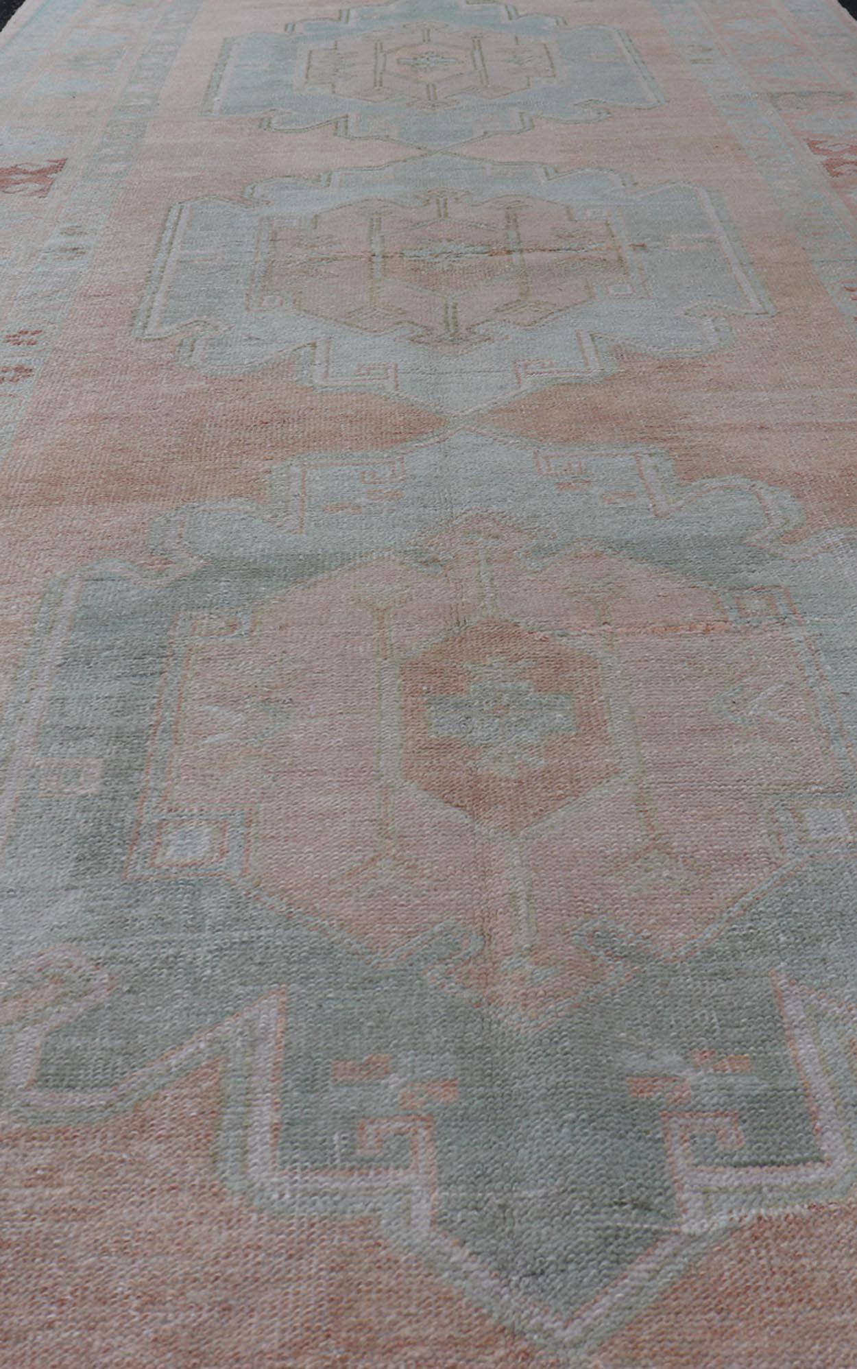 20th Century Light Color Turkish Oushak Vintage Gallery Runner with Medallions For Sale