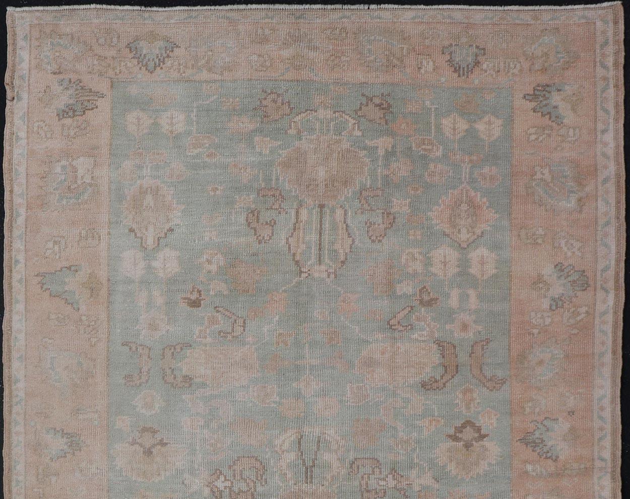 20th Century Light Colored Turkish Vintage Oushak Rug with All-Over Design in Light Green For Sale