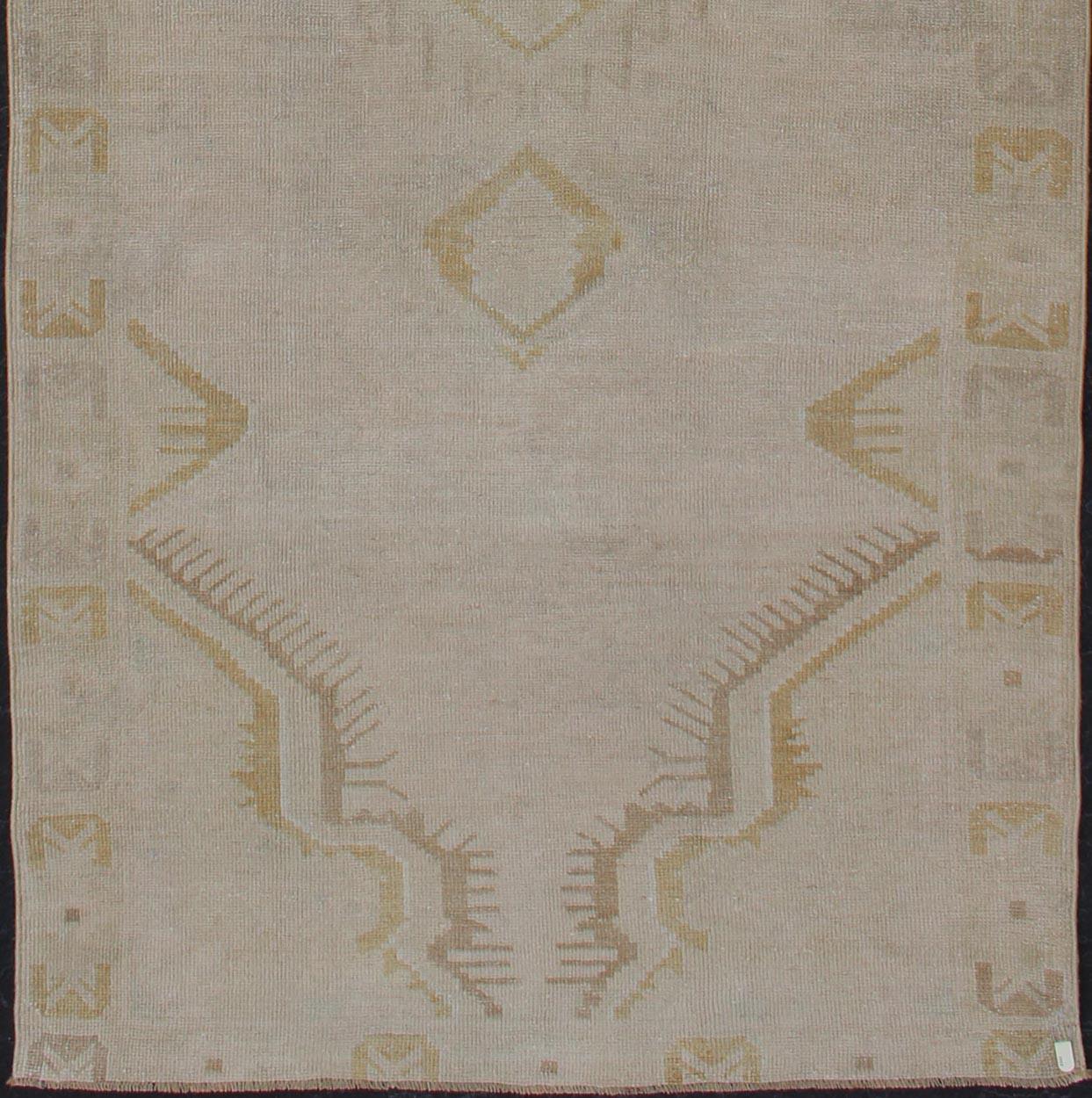 Turkish Light Colored Vintage Oushak Runner with Geometric Medallions in Taupe Color For Sale