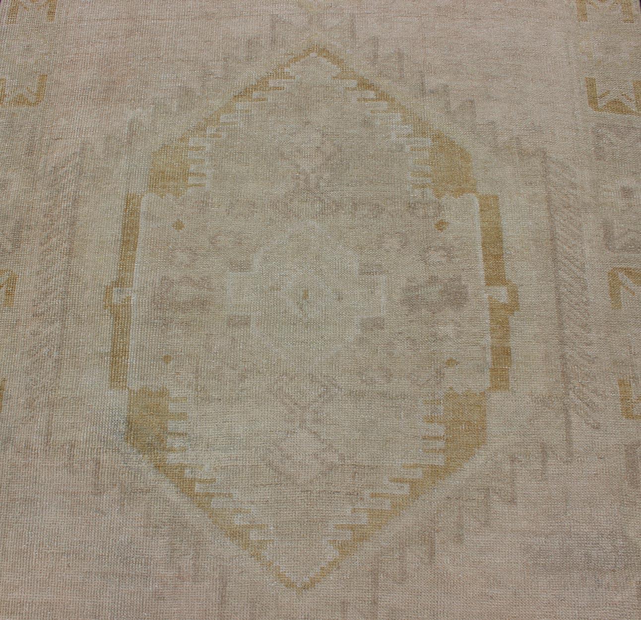 20th Century Light Colored Vintage Oushak Runner with Geometric Medallions in Taupe Color For Sale