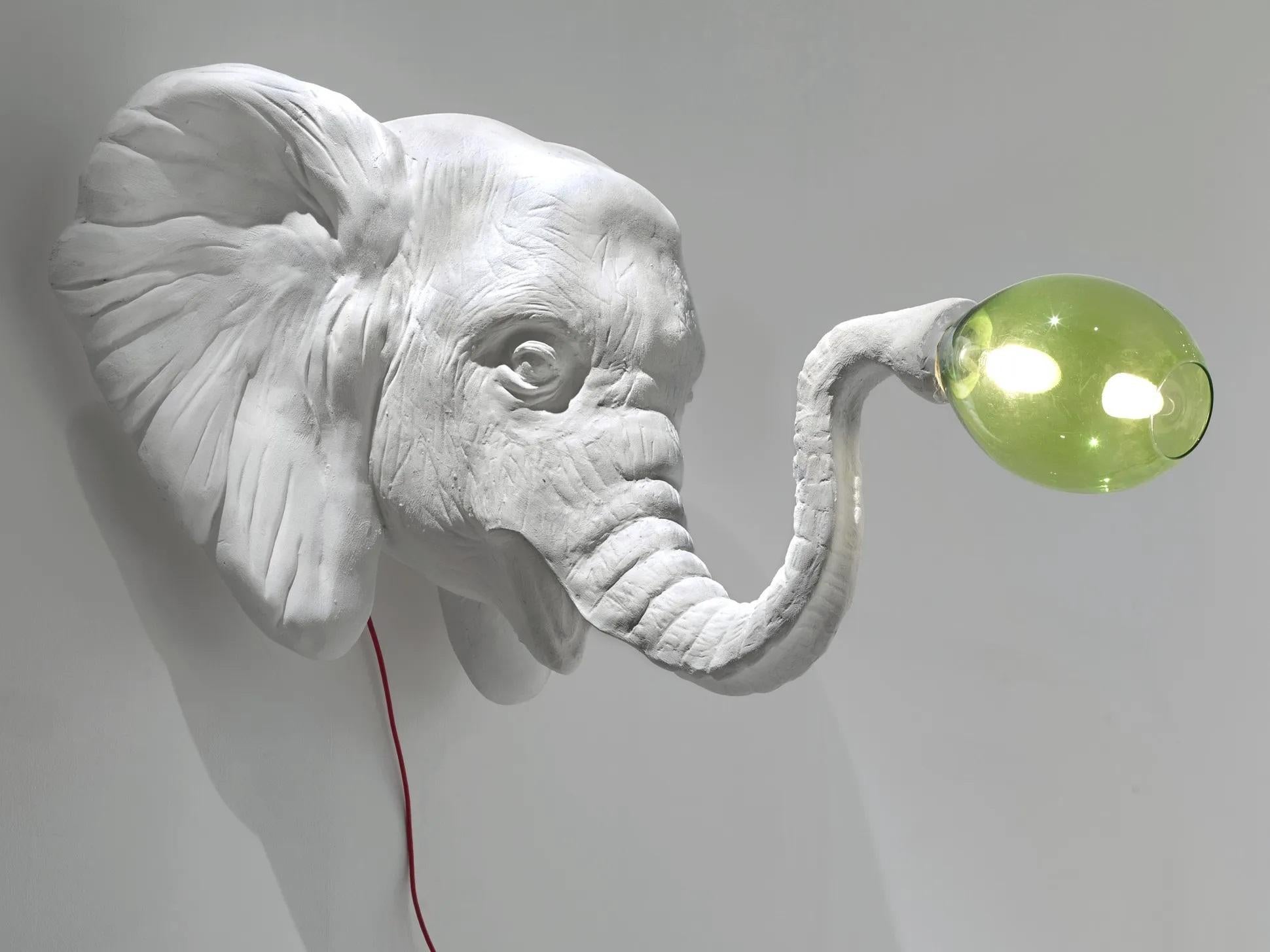 Light elephant wall lamp by Imperfettolab
2011
Designer : Verter Turroni
Dimensions: W 100 x D 135 X H 95 cm
Materials: Fibreglass

Nature and its creatures immersed in a dreamy and playful atmosphere are the inspiration for this unique lamp.