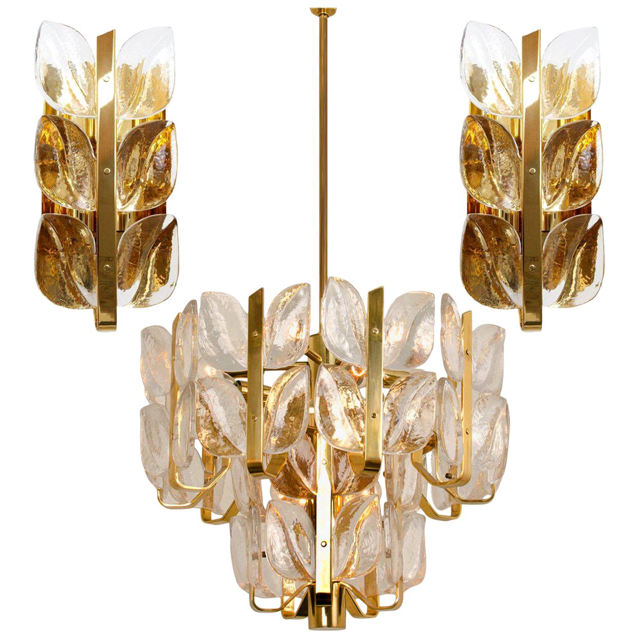 We offer an amazing set of Kalmar light fixtures. The set is executed to a very high standard. Model Florida, by J.T. Kalmar, manufactured in midcentury, circa 1970.

The fixtures are made of plated gold and large fire-polished brilliant crystal