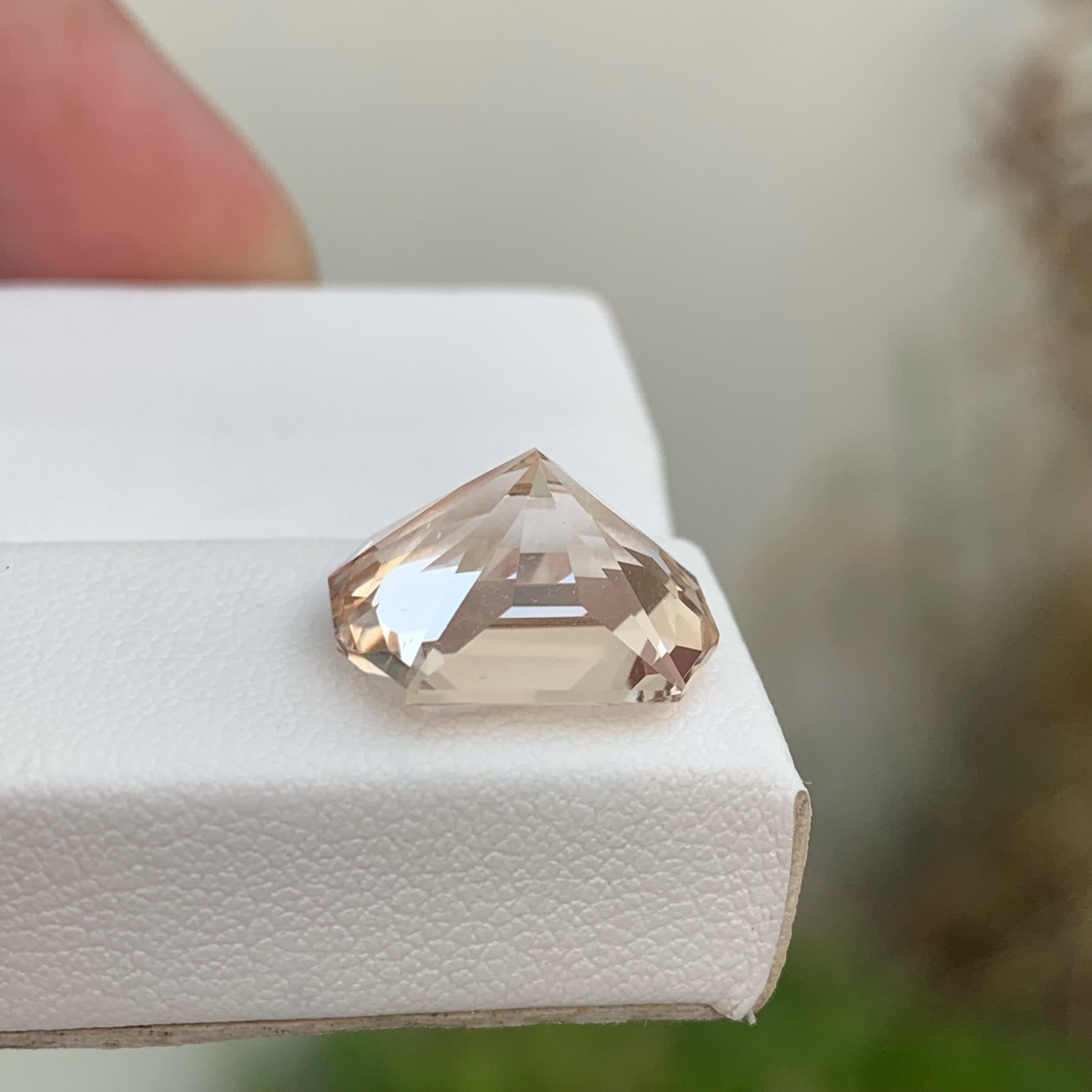 Weight 8.90 carats 
Dimensions 13.3 x 11.1 x 8 mm
Treatment None 
Origin Pakistan 
Clarity Eye Clean 
Shape Octagon 
Cut Custom Precision



Discover the captivating beauty of our Custom Precision Cut Light Gold Topaz gem, a natural Pakistani
