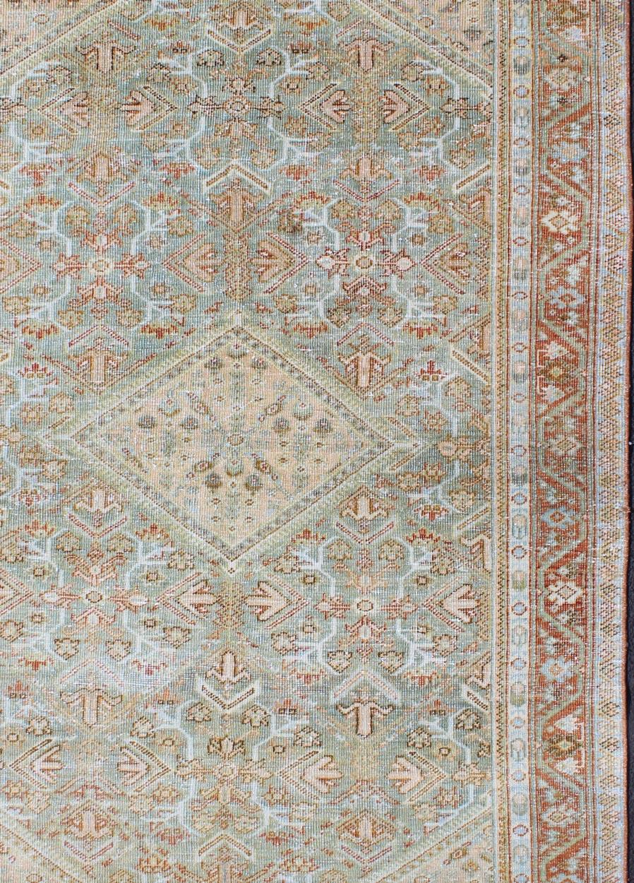 light green persian rug