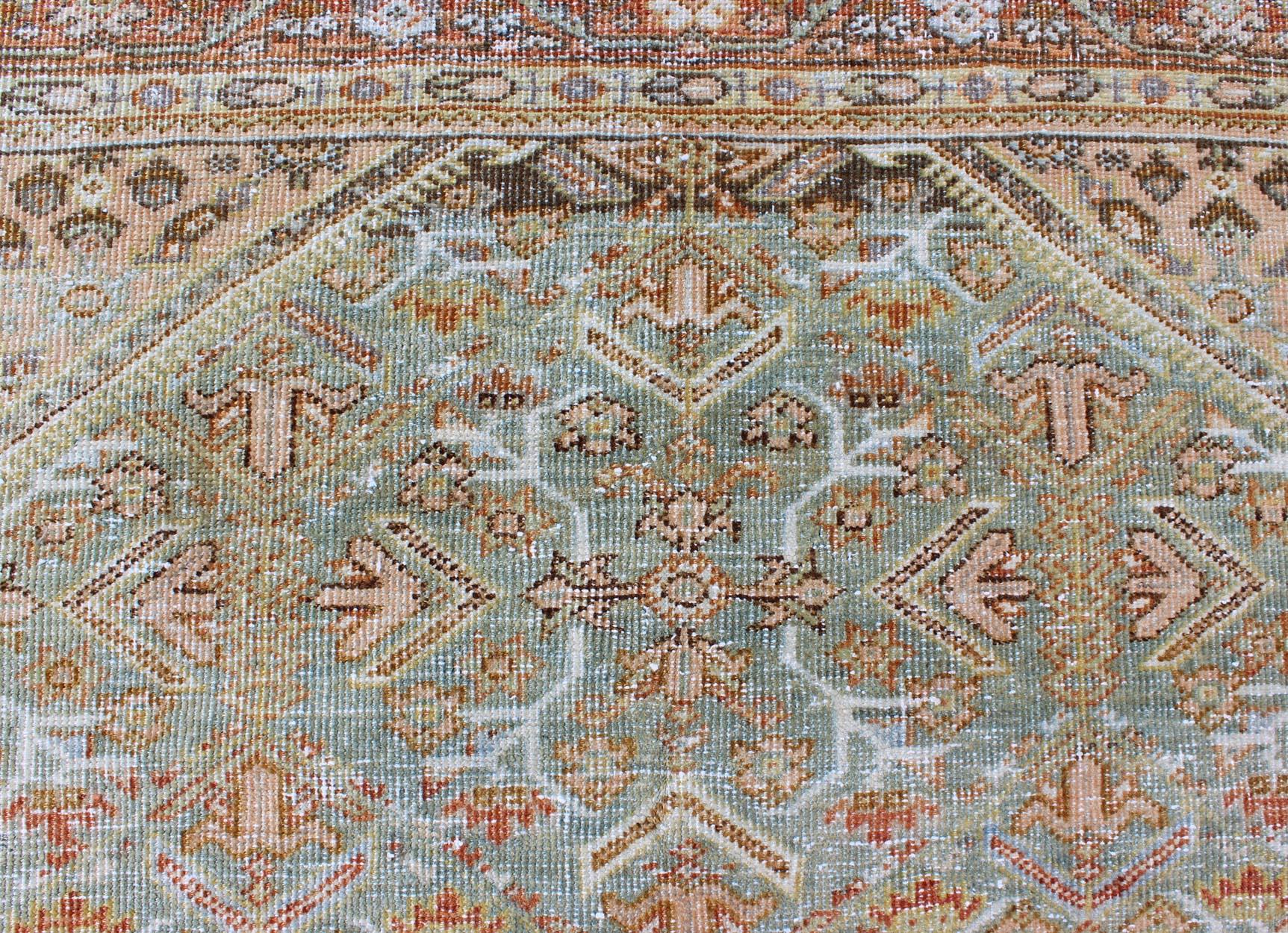Hand-Knotted Light Green and Red Antique Persian Mahal Rug with Peach Medallion Design For Sale