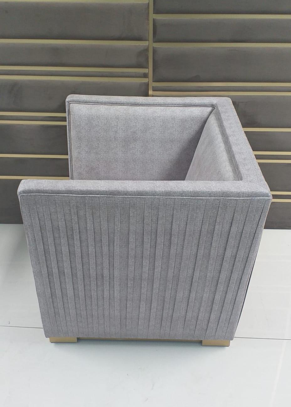 A very elegant and Classic piece full of special details such as side and back view and the brushed brass plinth. 

Upholstered with light green weekend 12.