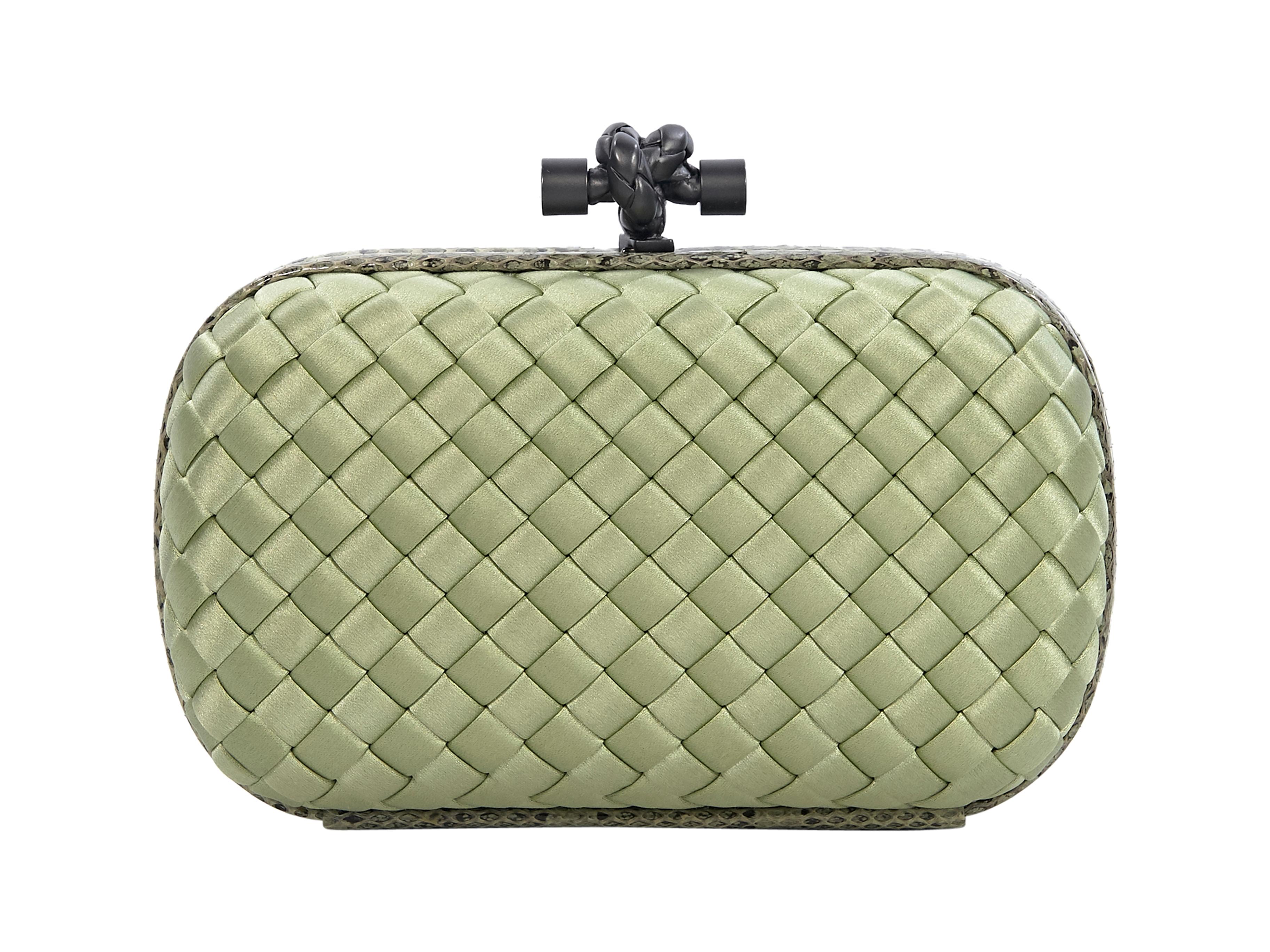 Product details:  Light green intrecciato silk clutch by Bottega Veneta.  Trimmed with snakeskin.  Knot push-lock clasp closure.  Lined interior.  Gunmetal-tone hardware.  Dust bag included.  8