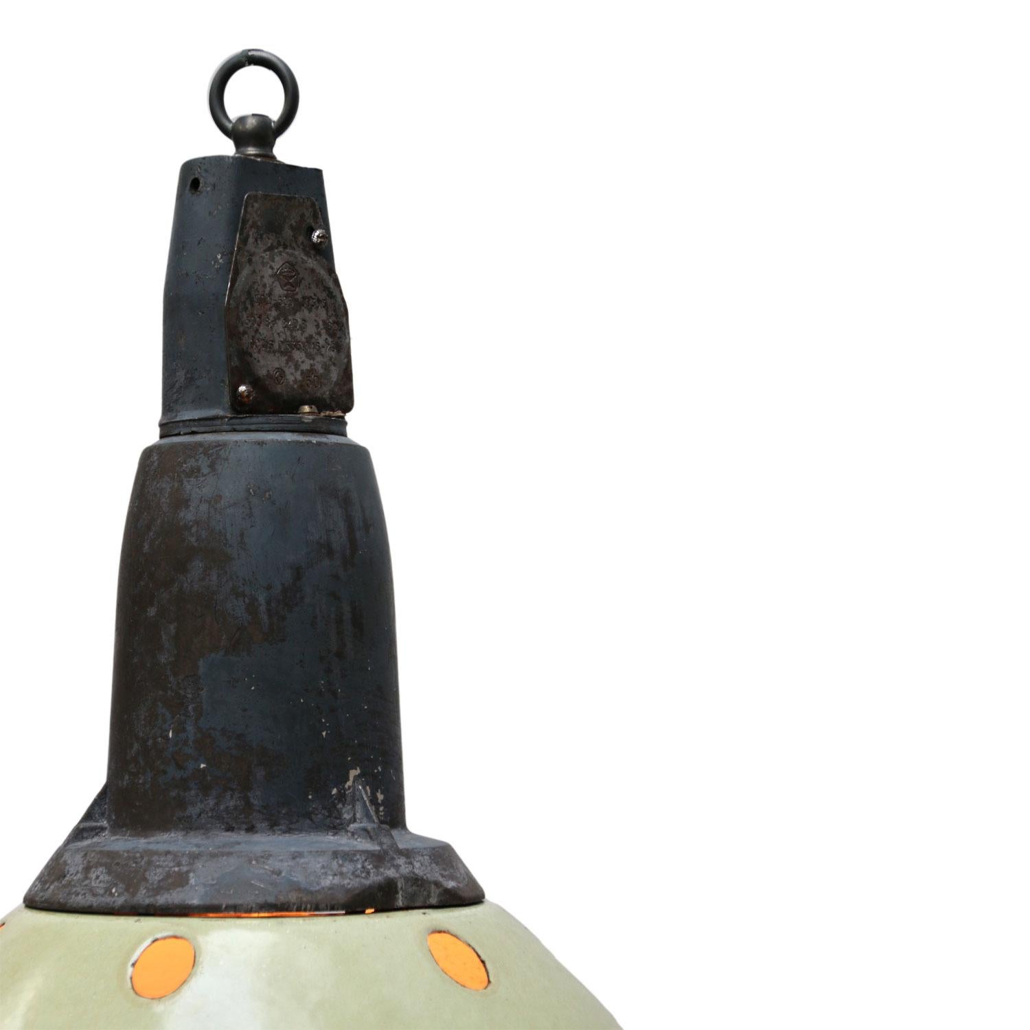 Enamel industrial pendant.
Light green enamel shade, white inside.
Dark grey cast aluminium top

Weight: 2.70 kg / 6 lb

All lamps have been made suitable by international standards for incandescent light bulbs, energy-efficient and LED bulbs.