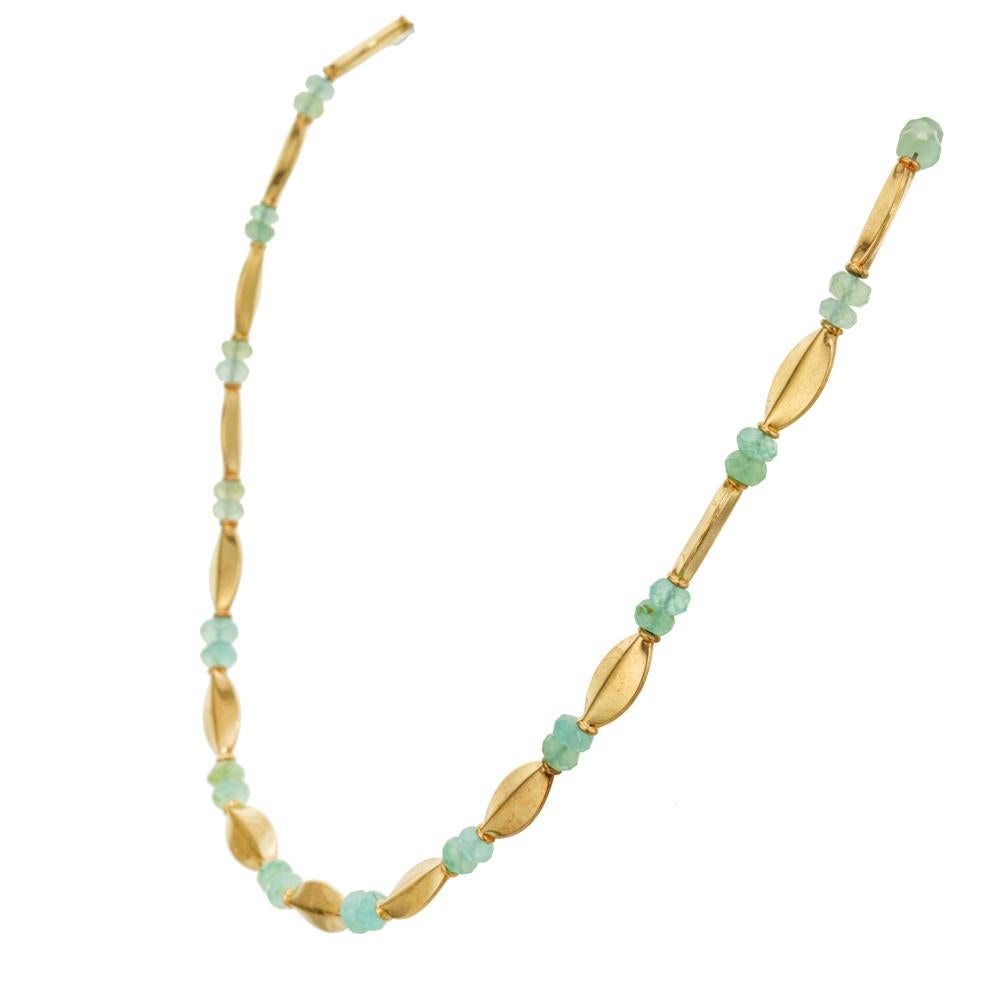 Beaded 22k yellow gold toggle necklace. 36 light green translucent beads, separated by 22k yellow gold oval spacers. 17 inches long.  Signed LG.

36 light green translucent beads 5mm
22k Gold
27.9 grams
Stamped: LG 22k
19 22k gold links 7mm wide and