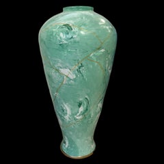 Light green marble ceramic tea jars and gold kintsugi