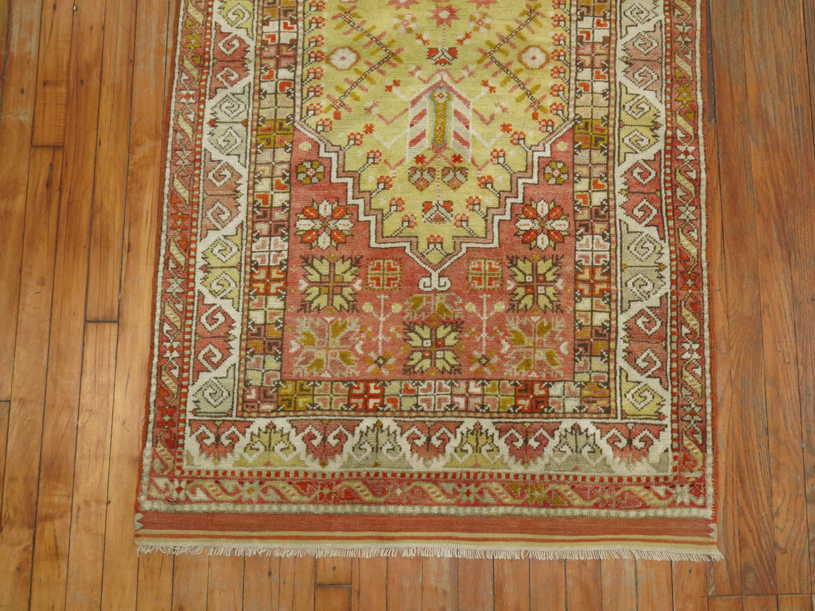 A handmade Turkish Rug with a prayer niche design in predominant colors in light greensand coral, circa 1920

Measures: 3'2