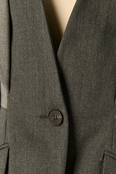 Giacca monopetto effetto trompe-l'œil nei toni del grigio chiaro e dell'antracite di Alexander McQueen