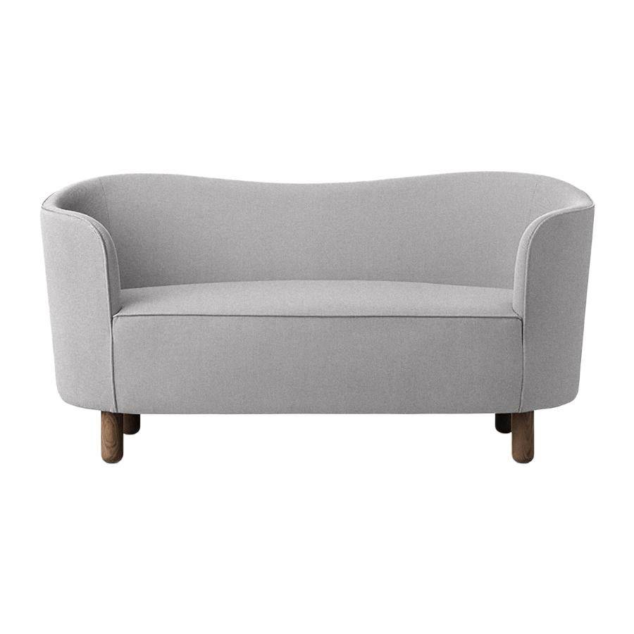 Light grey and smoked oak Raf Simons vidar 3 mingle sofa by Lassen
Dimensions: W 154 x D 68 x H 74 cm 
Materials: textile, oak.

The Mingle sofa was designed in 1935 by architect Flemming Lassen (1902-1984) and was presented at The Copenhagen