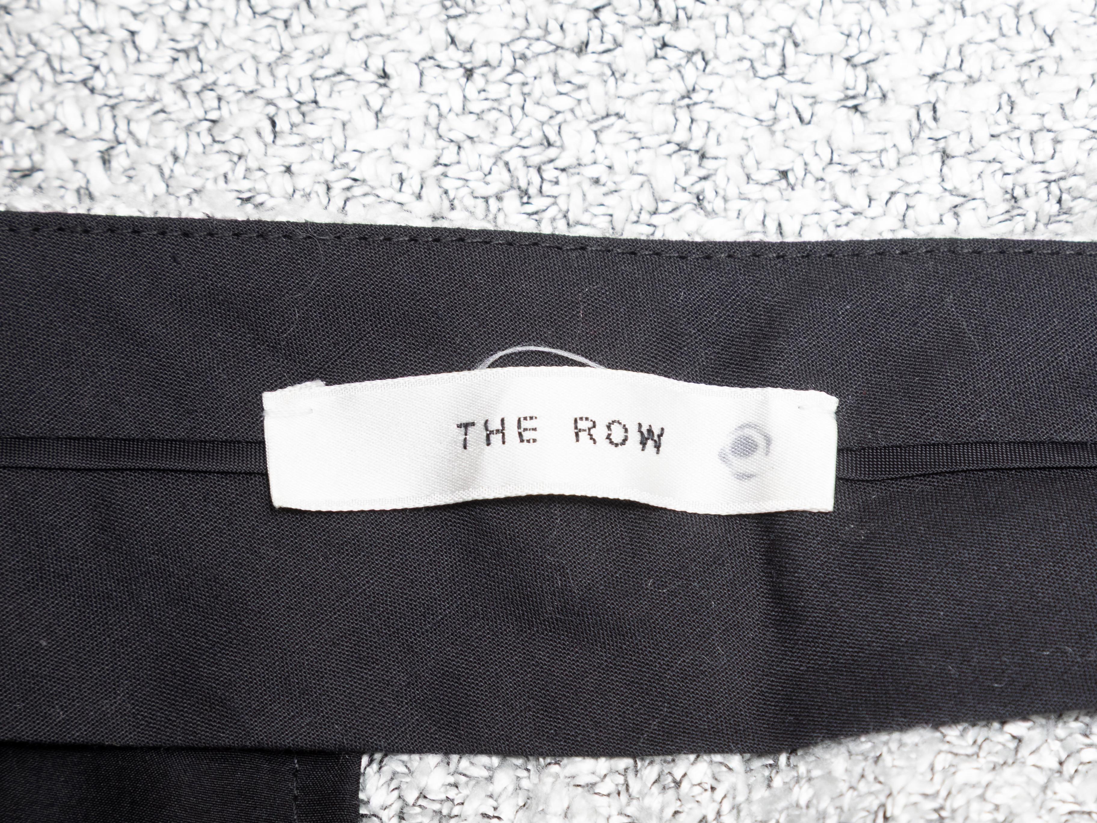 Pantalon à plis à jambe droite gris clair The Row. Trois poches. Fermeture sur le devant. Taille 27