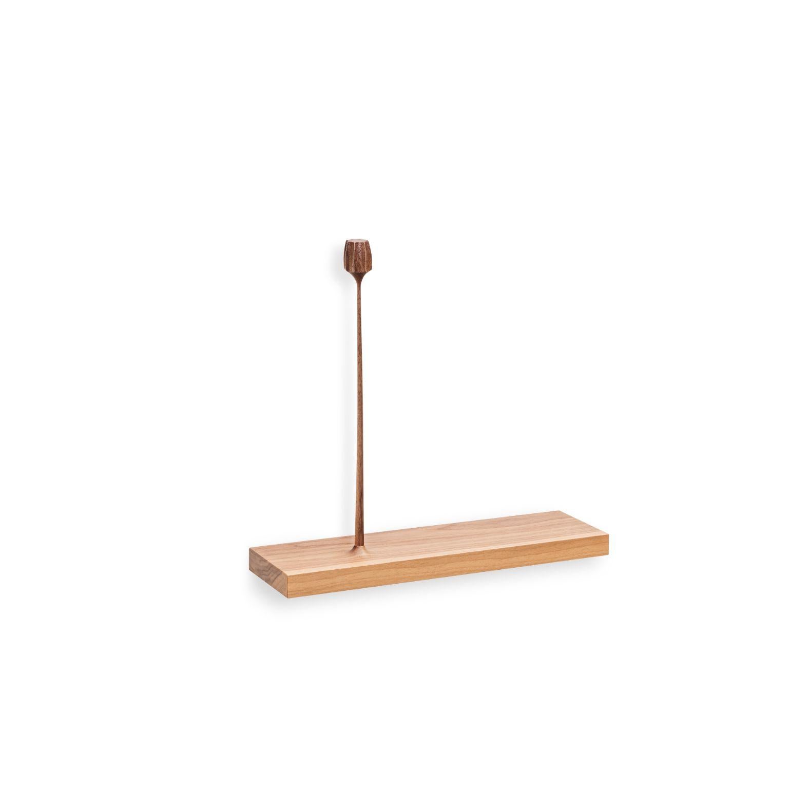 Light Kukkii sculpture 1 flower by Antrei Hartikainen.
Materials: black stained oak, natural oil waxed walnut.
Dimensions: W 75 / 60 / 40 cm, D 10 cm, H 34 / 42 cm.

Also available: dark color & different flower amounts.

Kukkii (blooms) is a