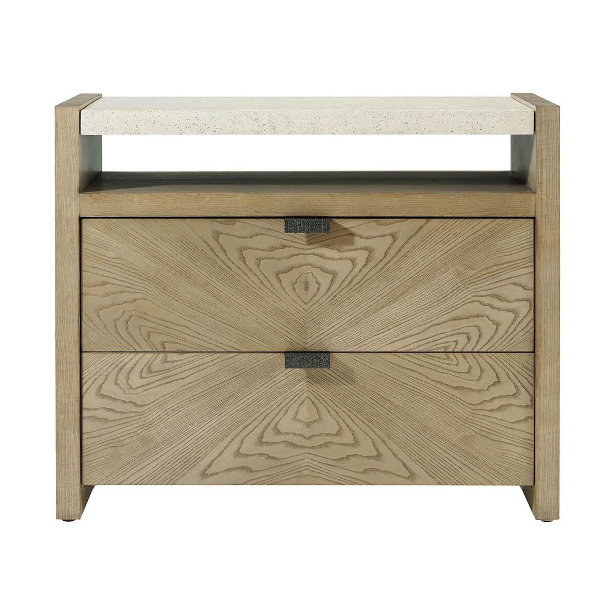 a handsome bedside nightstand in figured cathedral ash in a light dune finish with metal pulls in our Ember finish and soft close drawers.

The top of this nightstand is done in our exclusive Mineral finish. It is perfect for storing your bedroom