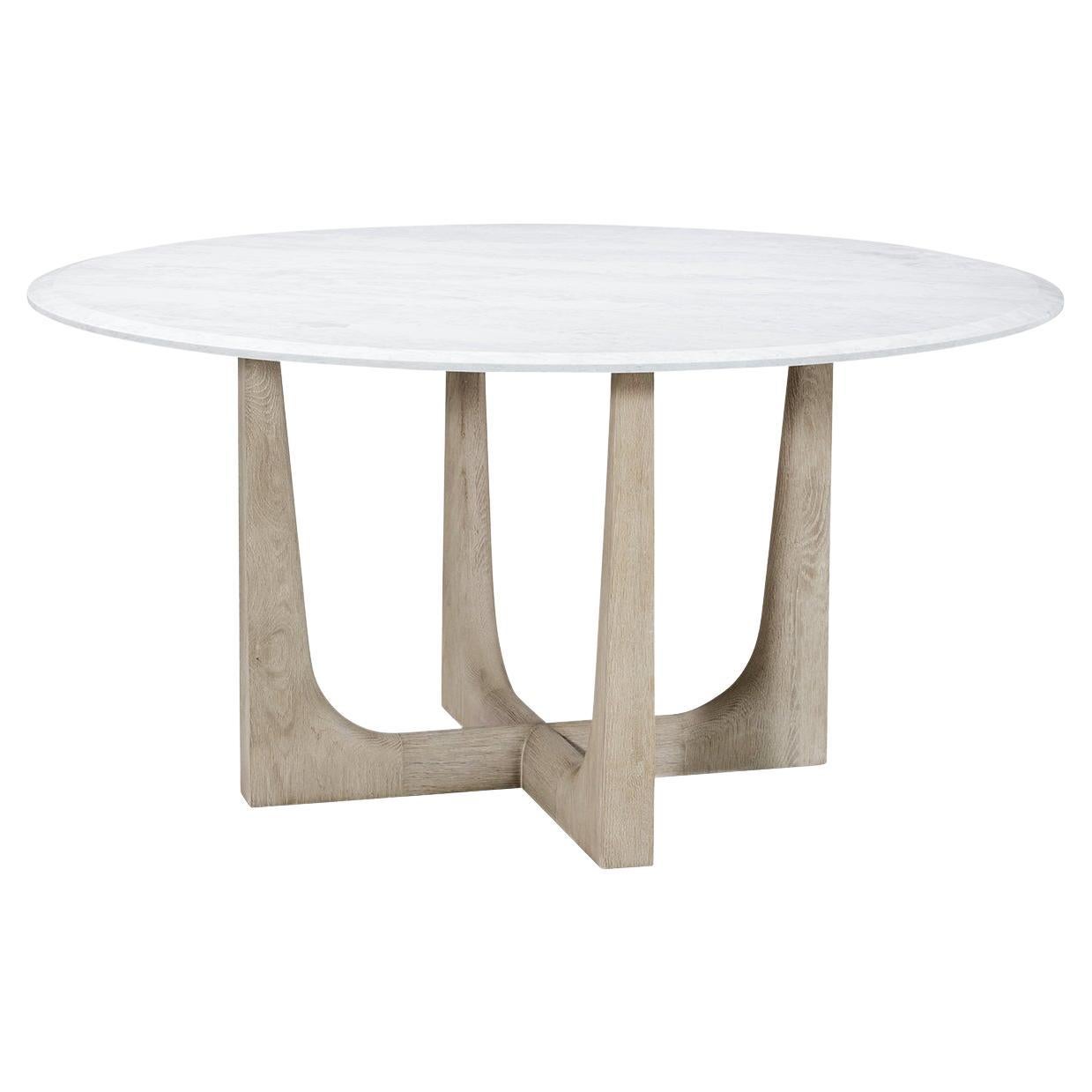 Mesa de comedor redonda de roble claro y cuarzo
