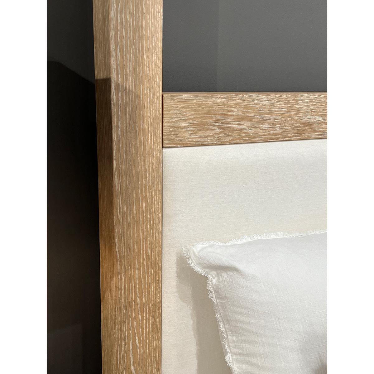 

A Modern Light Oak Canopy Bed with a wonderful whitewashed natural oak finish. 

With polished brass accents and a bold frame, the simple cubist form captures the essence of minimalism.

US King Dimensions: 84