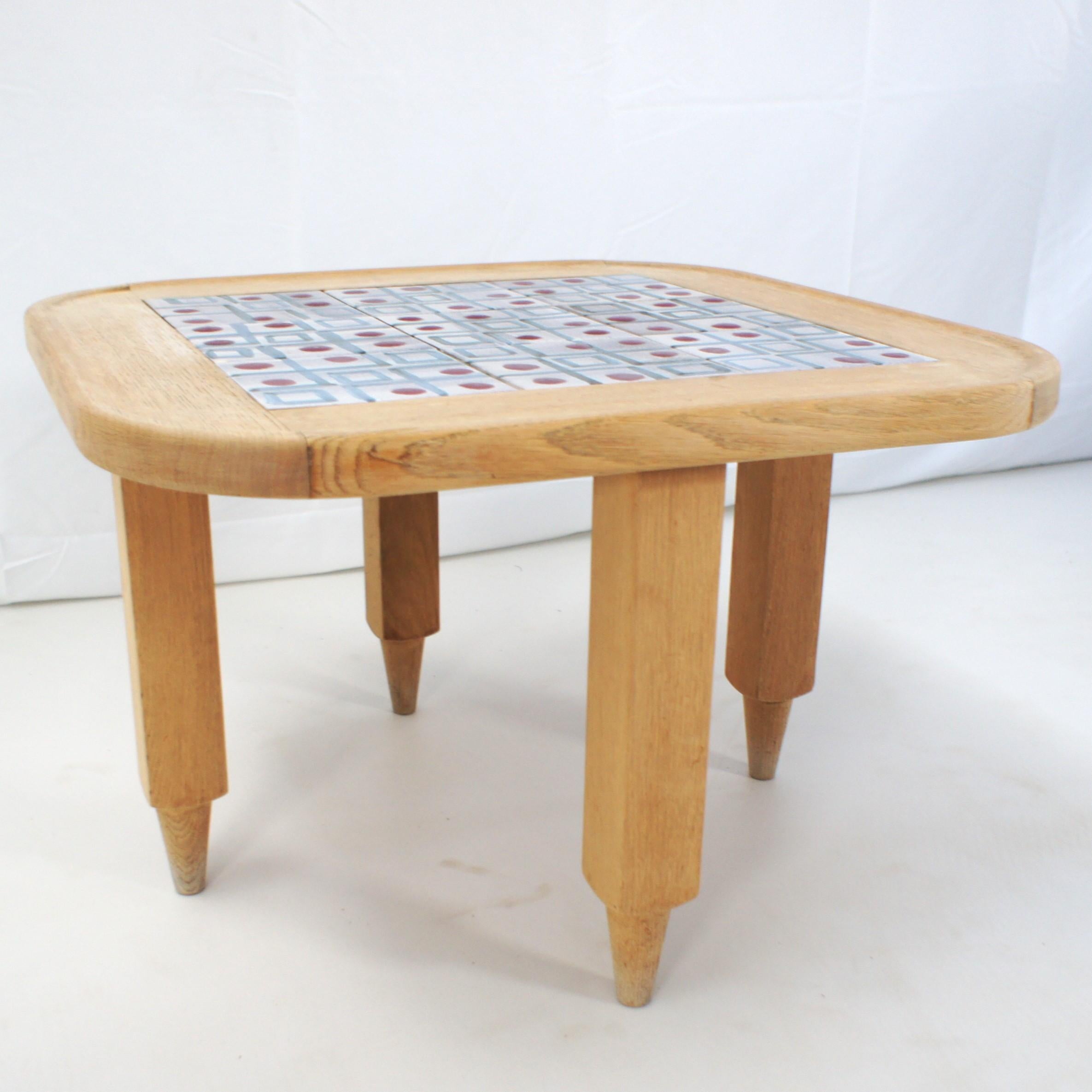 Very nice light oak and ceramics coffee table by Guillerme et Chambron.