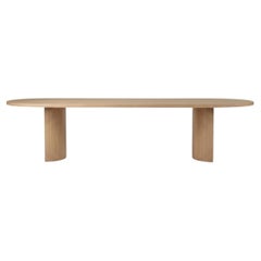 Mesa de comedor ovalada de roble claro, roble europeo macizo, modelo «Aperta Capsule» de Mokko