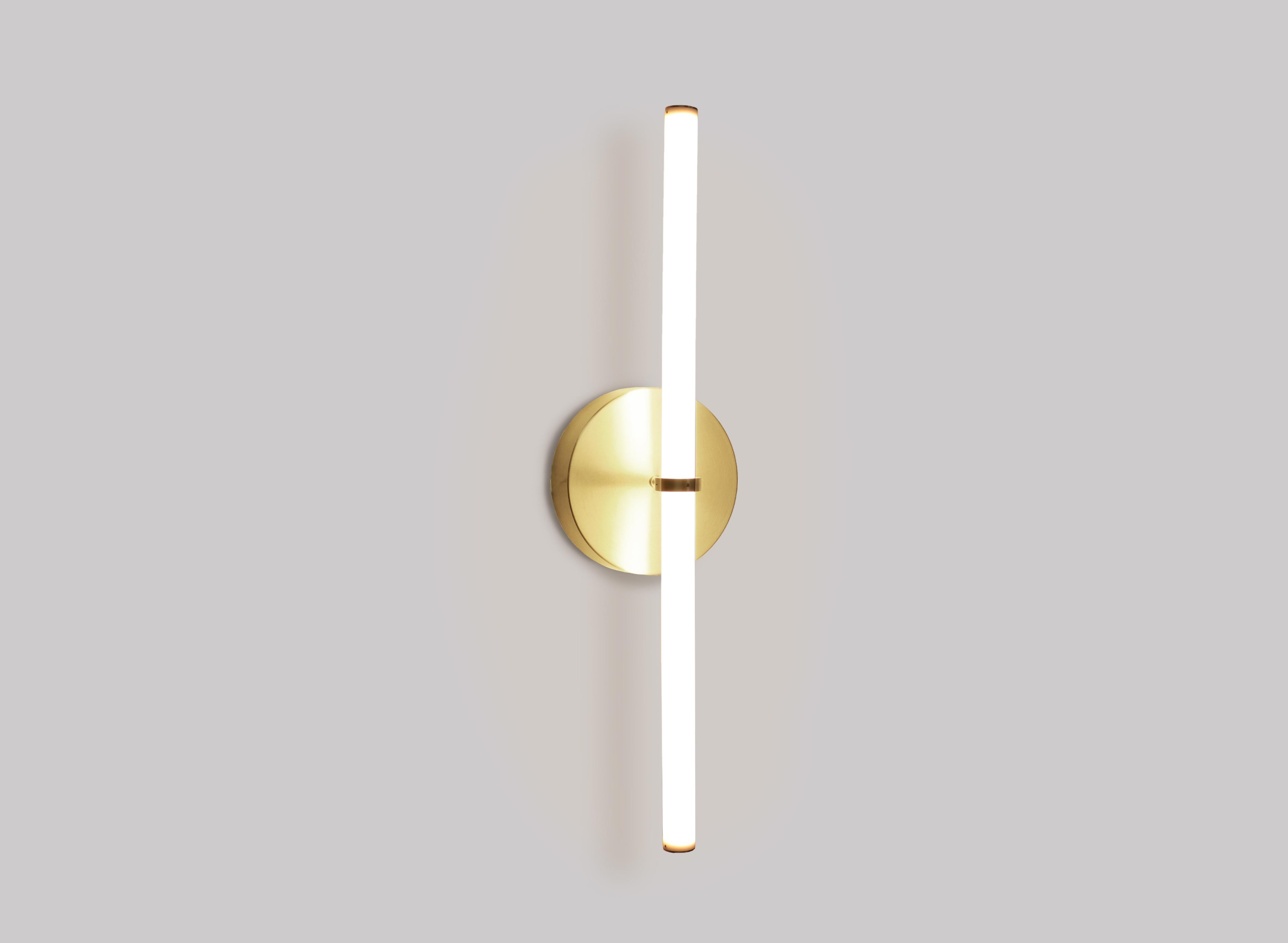 Wall light object.

Formed by basic geometric shapes: circle and a line. Elegant and simple, this light object is a true design masterpiece.

Lead time: 8 weeks
Dimensions: 80/60/40 cm x 5 cm (height to order)
Materials: brass, acrylic tube, LED