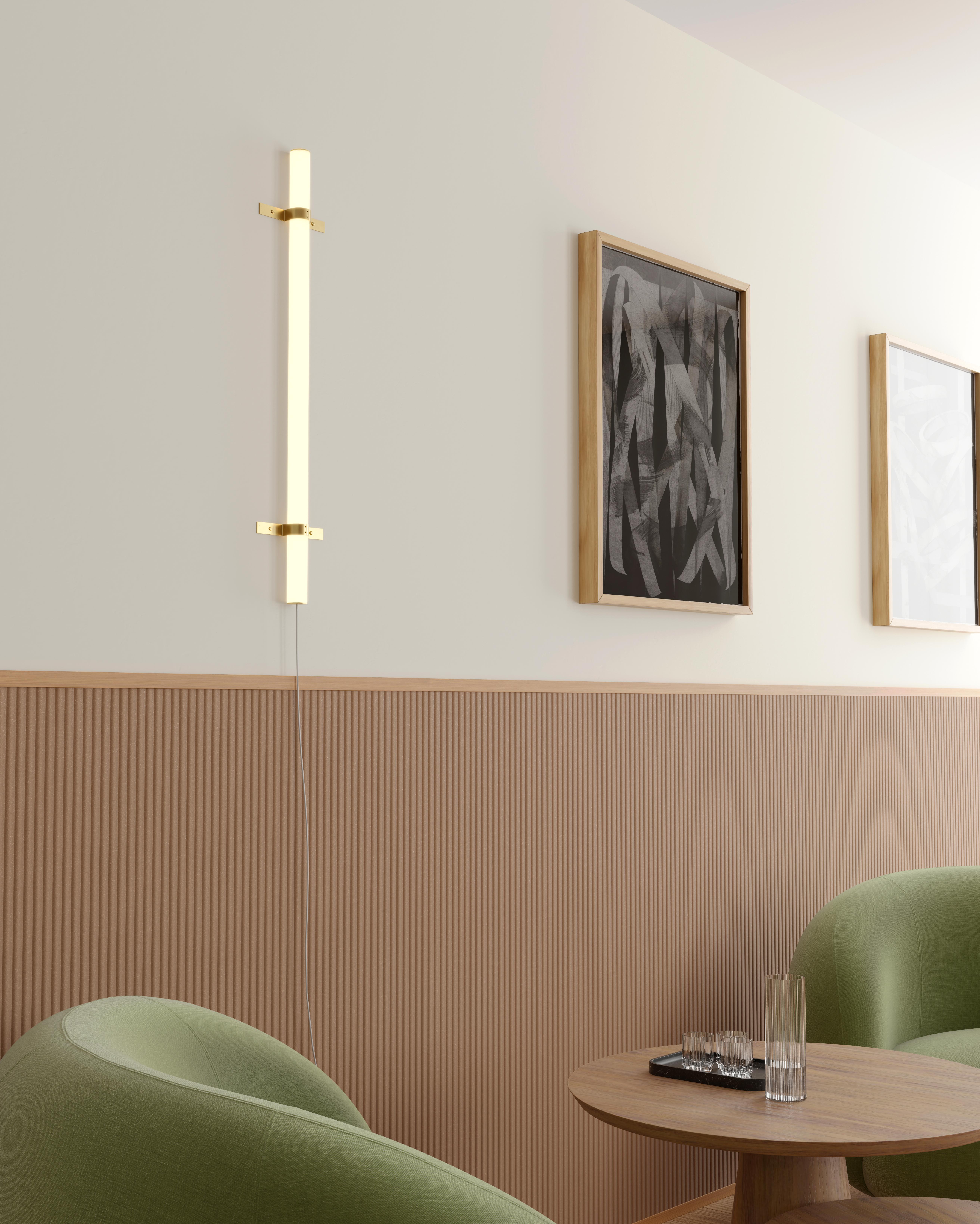 Wall light object.

Light Object 016, the wall variant of Light Object 017, is a straight line of light elegantly attached to the wall with two brass elements. Simplicity at its best.

1680Lead time: 8 weeks
Dimensions: 80 cm x 16 cm
Materials: