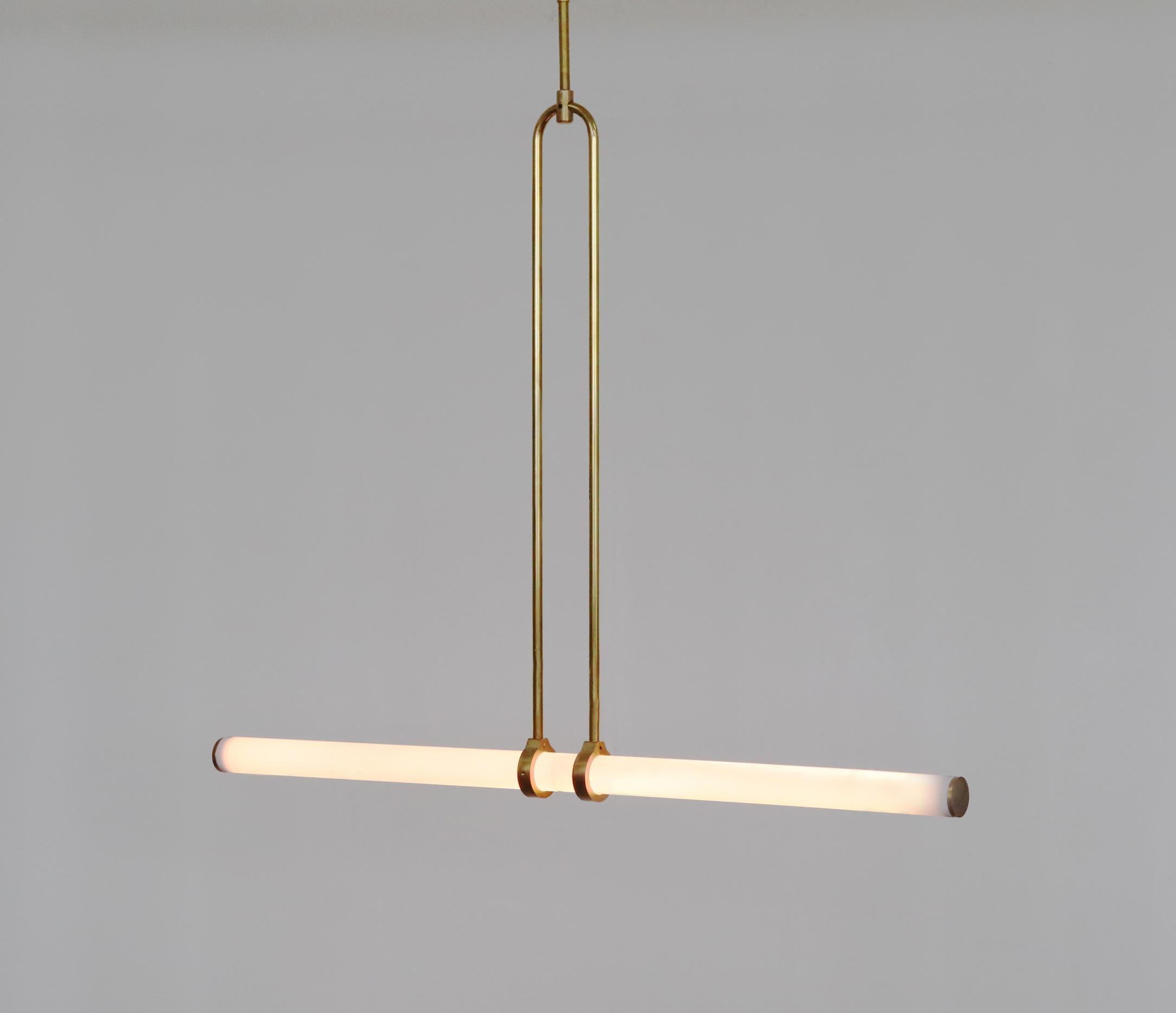 Light object 018 by Naama Hofman
Dimensions: W 81 H 68-150cm (height to order)
Light tube diameter: 35 mm
Brass pipe diameter: 10 mm
Canopy diameter: 20 cm.


Material : Polished Brass pipe, Acrylic tube, LED lights
Finish: Natural
