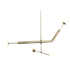 Objeto luminoso 020.2 Colgante de 4 luces en latón de Naama Hofman