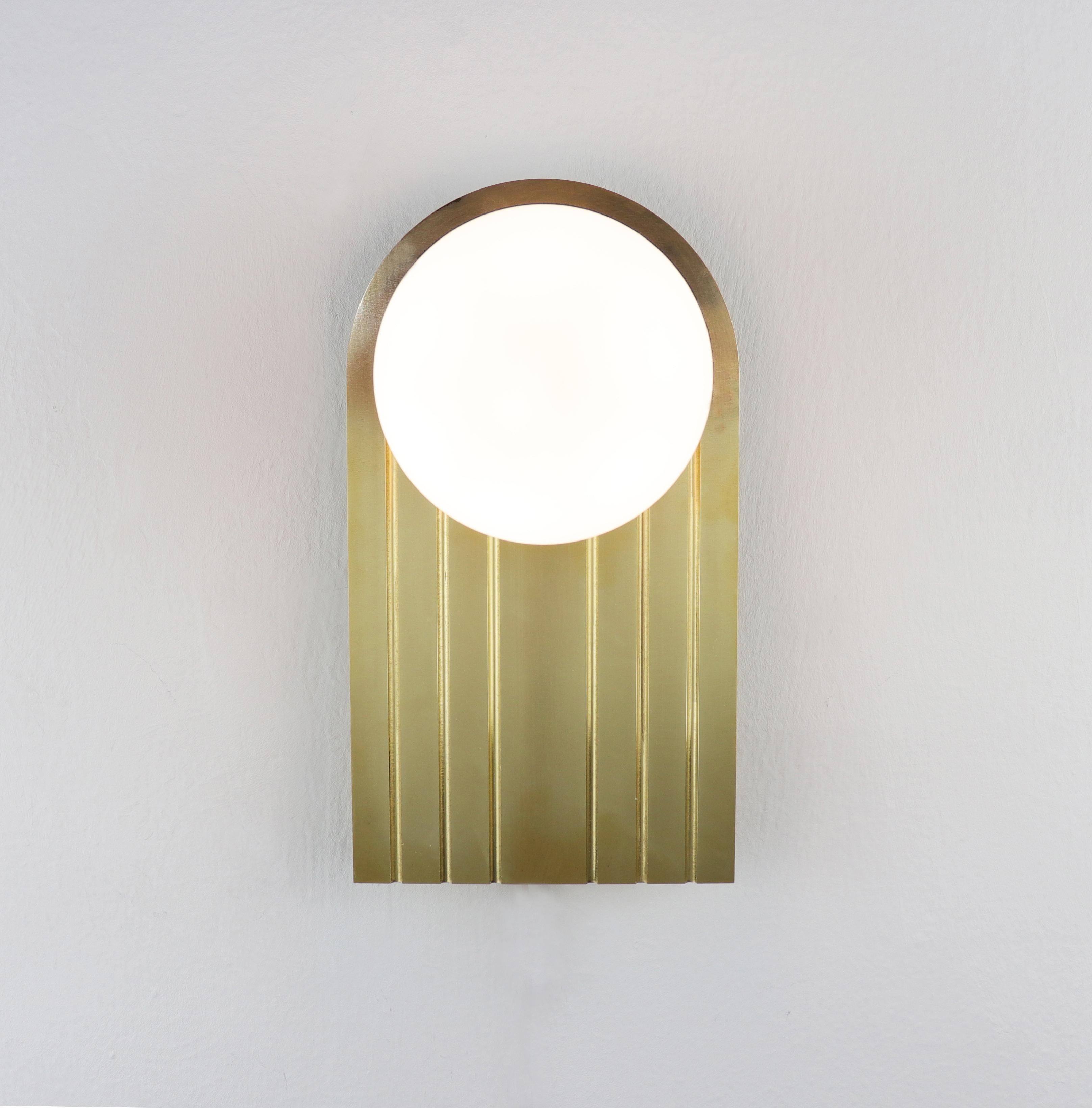 LIGHT OBJECT 021
Wall light object.

Inspired by the Modernist movement, this wall light object complements spaces such as bathrooms, bedrooms and corridors.

Lead time: 8 weeks
Dimensions: 13.1 cm x 23.8 cm (height to order)
Brass palette