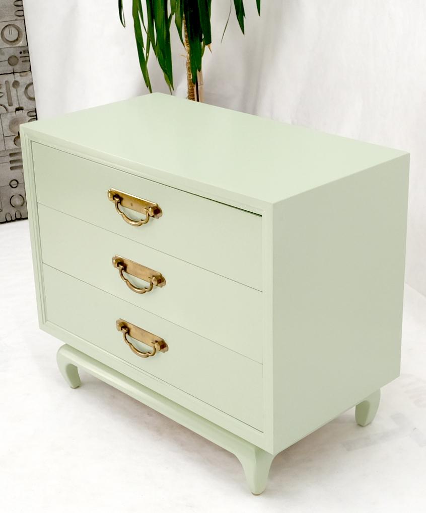 Mid-Century Modern decorative olive lacquer brass drop pulls small three drawer dresser bachelor chest in fully restored condition.
