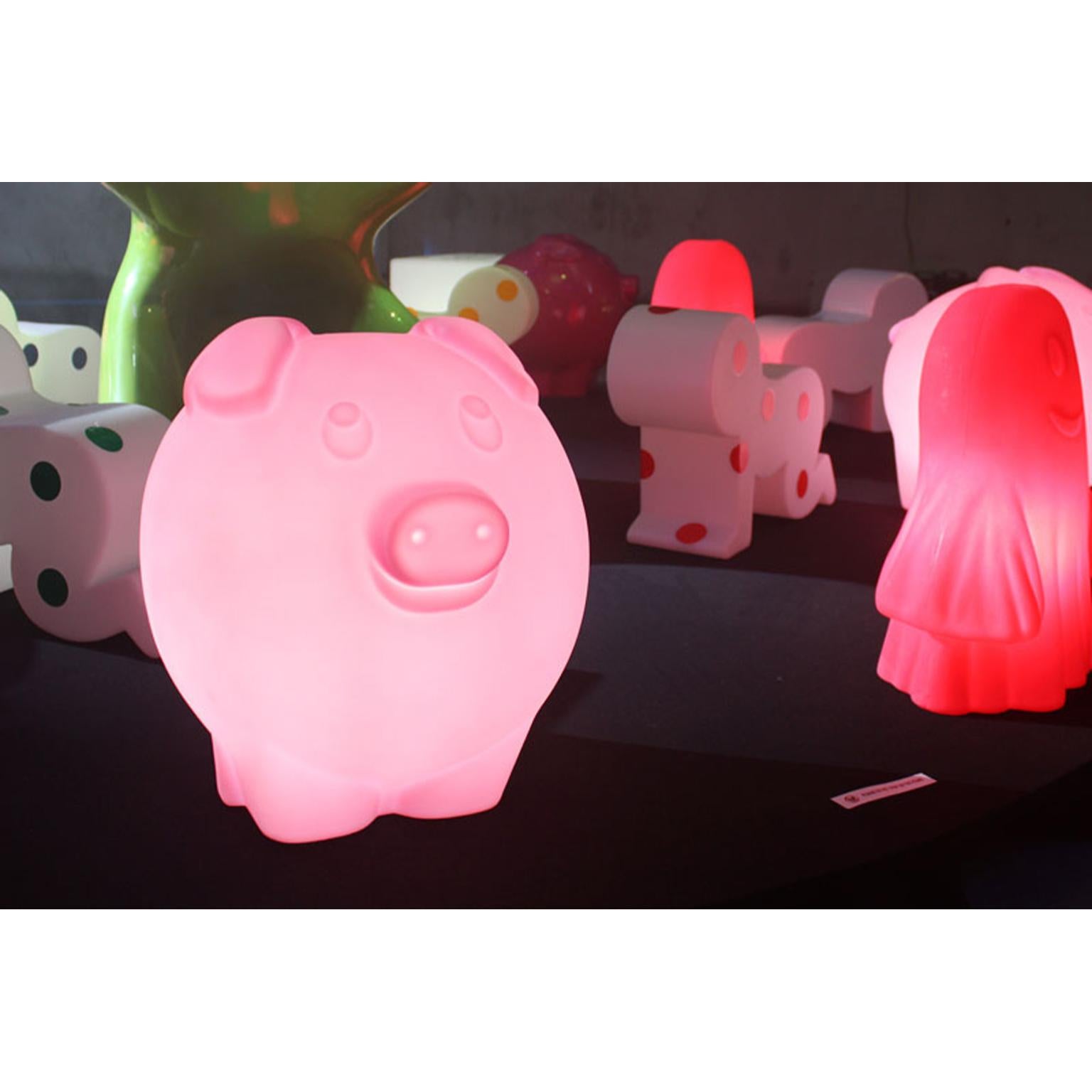 Light Orange Peggy Table Lamp by SLIDE Studio
Dimensions: D 42 x W 32 x H 40 cm.
Materials: Polyethylene.

Available in different color options. Prices may vary. This product is suitable for indoor and outdoor use. All our lamps can be wired