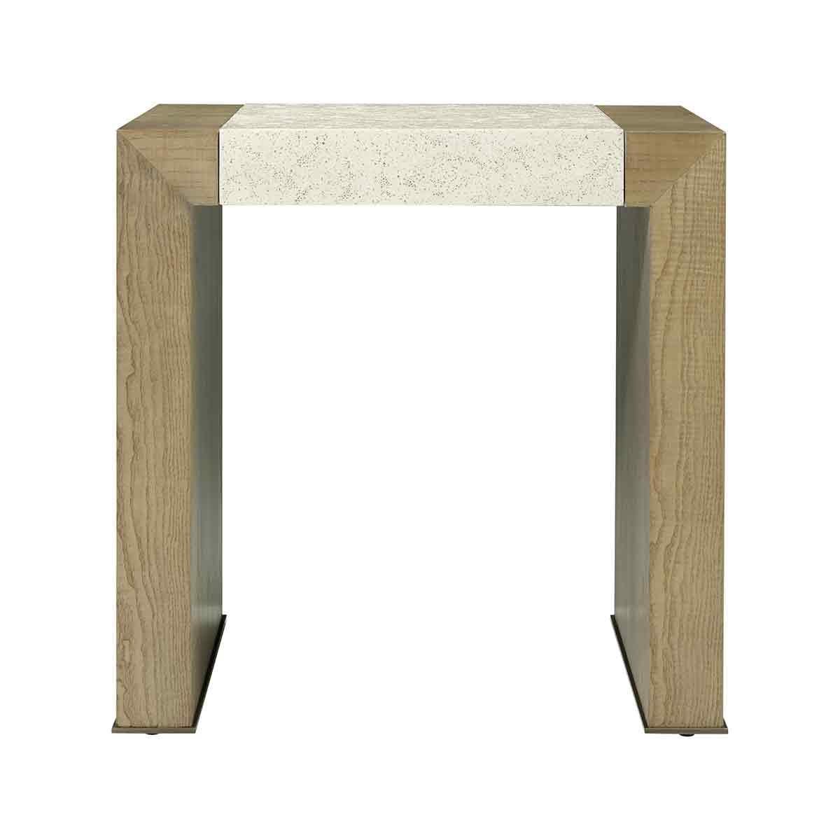 A modern side table made of figured cathedral ash in our light dune finish with our exclusive Mineral finish at the top and metal detail at the base of the legs in a bronze finish.
Dimensions: 24