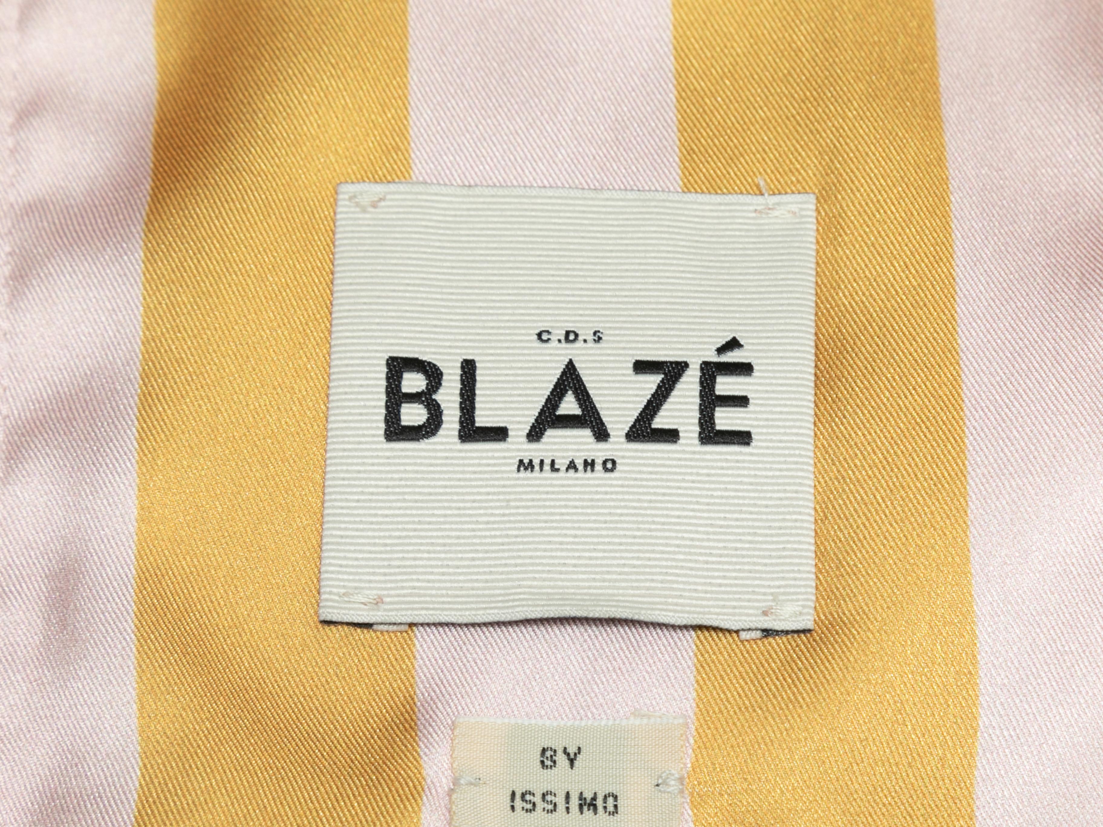 Light pink double-breasted silk blazer by Blaze Issimo. Peaked lapel. Three pockets. Button closures at front. 37