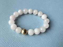 Bracciale con perline di quarzo rosa