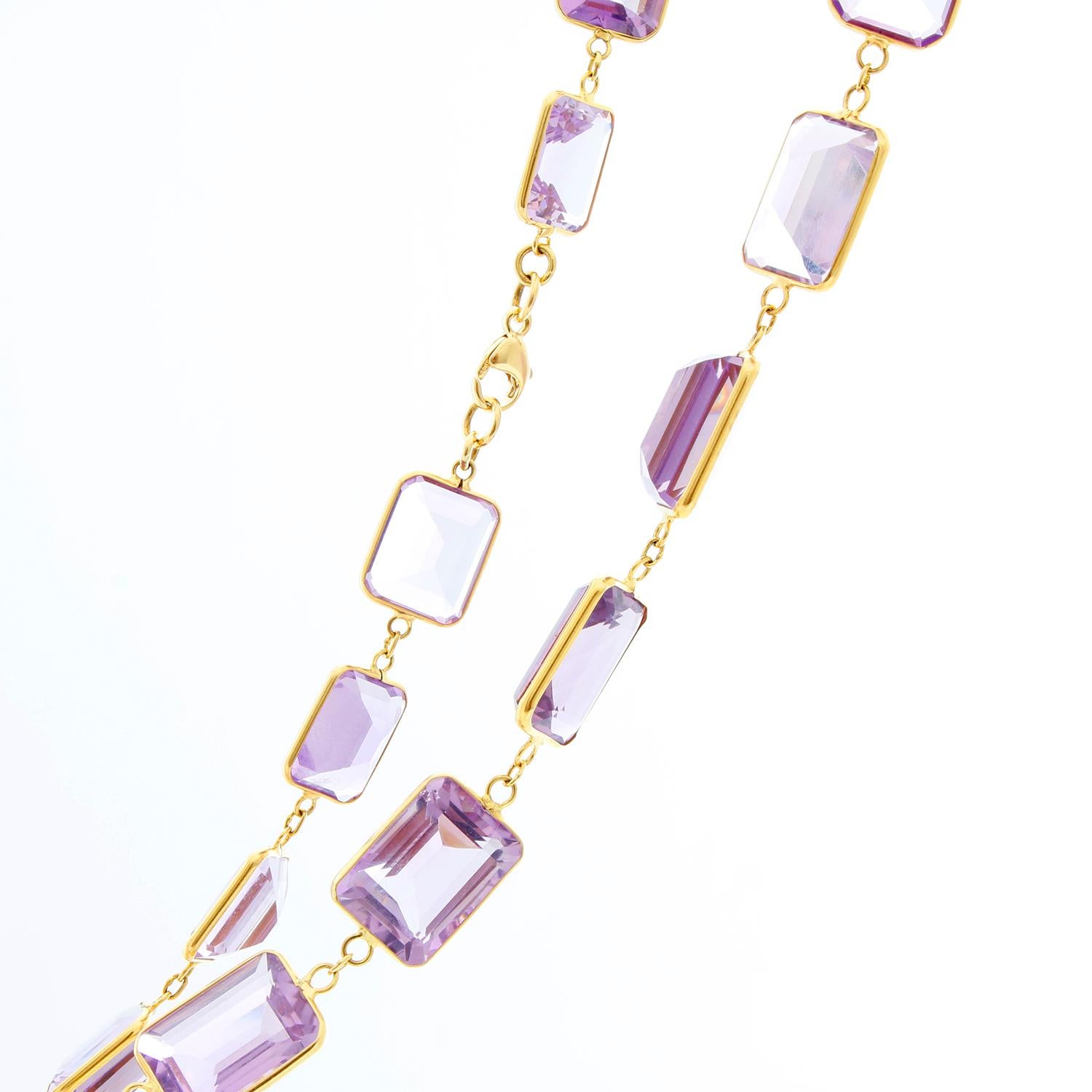 Light Purple Amethyst Necklace  - Dazzle in this light purple amethyst necklace that measures 18 inches long and has 40 stones. Holding everything together is 18k yellow gold. Approx 283 total ct weight. This necklace is unworn comes with a DeMesy