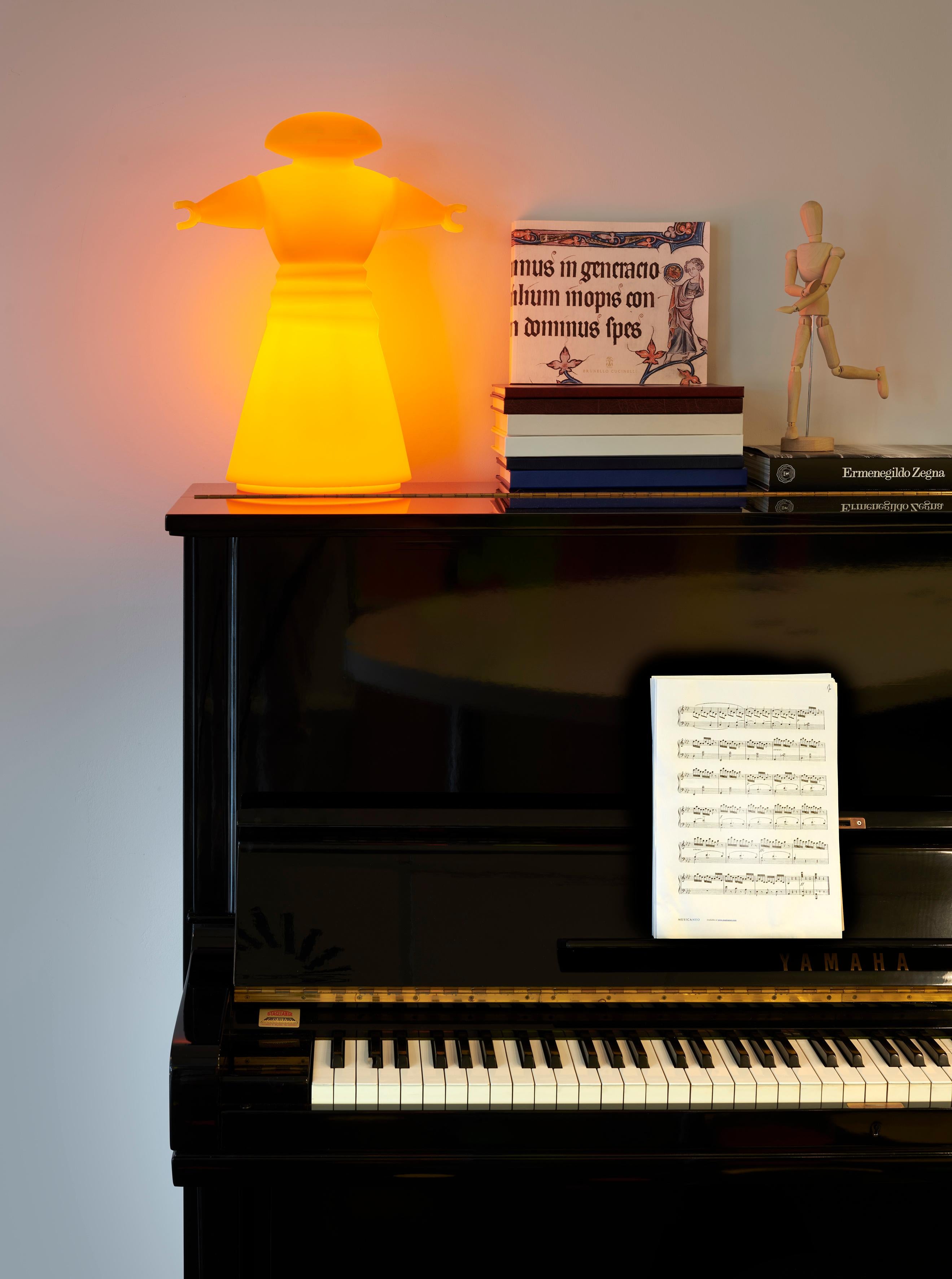 Light Red Mr. Bot Table Lamp by GlocalDesign
Dimensions: D 27 x W 37 x H 45 cm.
Materials: Polyethylene.

Available in different color options. Prices may vary. This product is suitable for indoor and outdoor use. All our lamps can be wired
