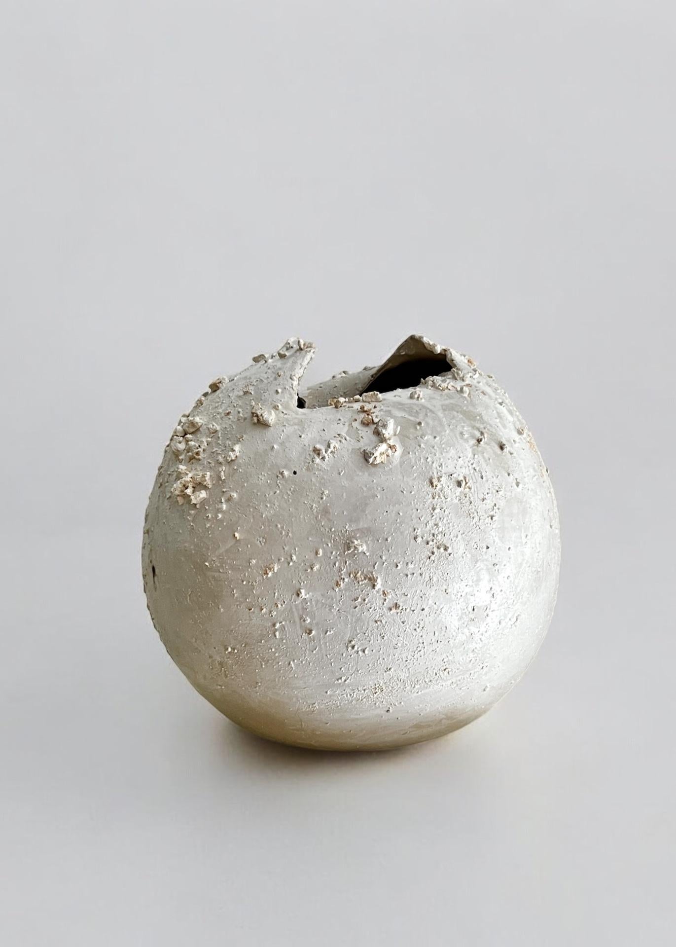 Light Rocks Stoneware Sculpture by Laura Pasquino
One of a kind
Dimensions: D 32 x H 30 cm
Material: White and beige stoneware, glaze.
 
Laura Pasquino
Incorporating references from ancient Korean ceramics as well as principles of Japanese