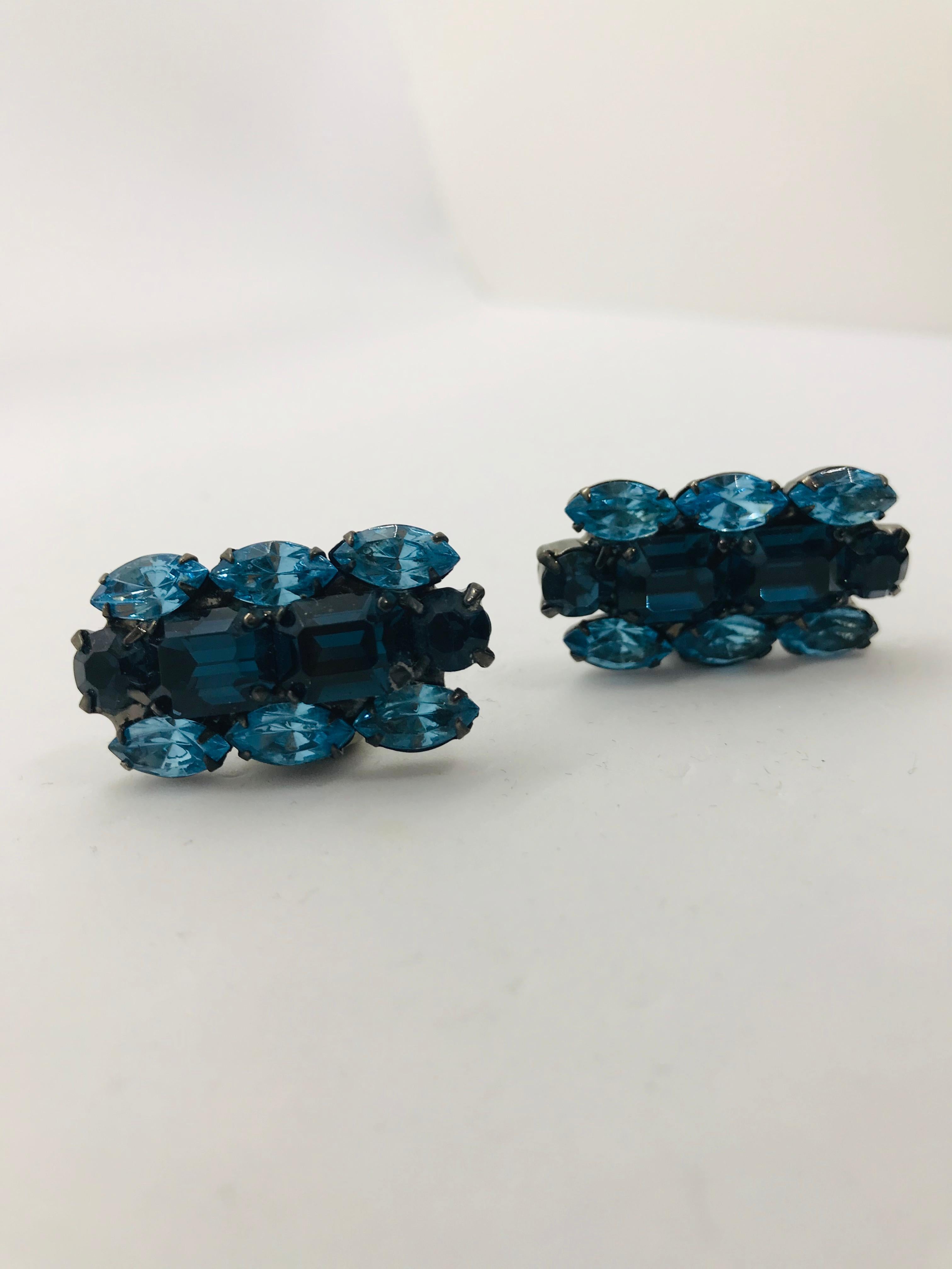 Add a touch of colour to any navy blue suit with our light sapphire and Montana blue sapphire Austrian crystal cuff links! these cufflinks look great at the office or wear them with a french cuff shirt and blue jeans.  Featuring 1960s vintage