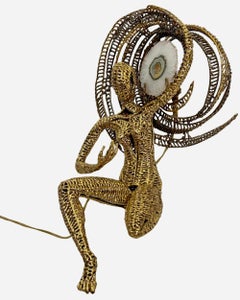 Sculpture lumineuse "Femme portant le soleil", par I+I-Faure, France circa 1989