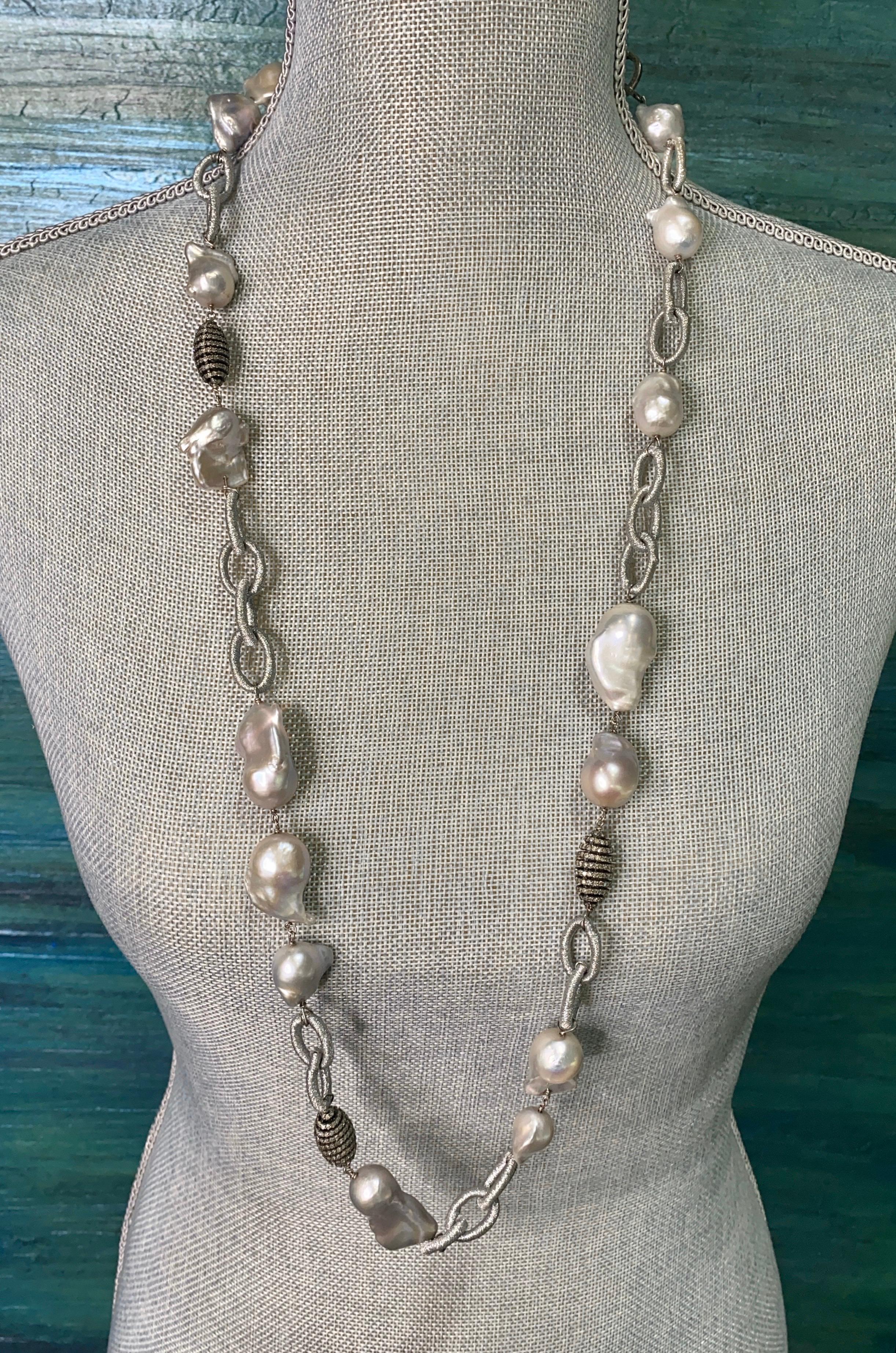 This necklace is an artful combination of silvery platinum, naturally colored baroque Edison pearls hand-wired onto glistening silver lurex links and sparkling diamond beads!  The pearls are 14 - 18 mm with a few whoppers (30mm long) and beautiful