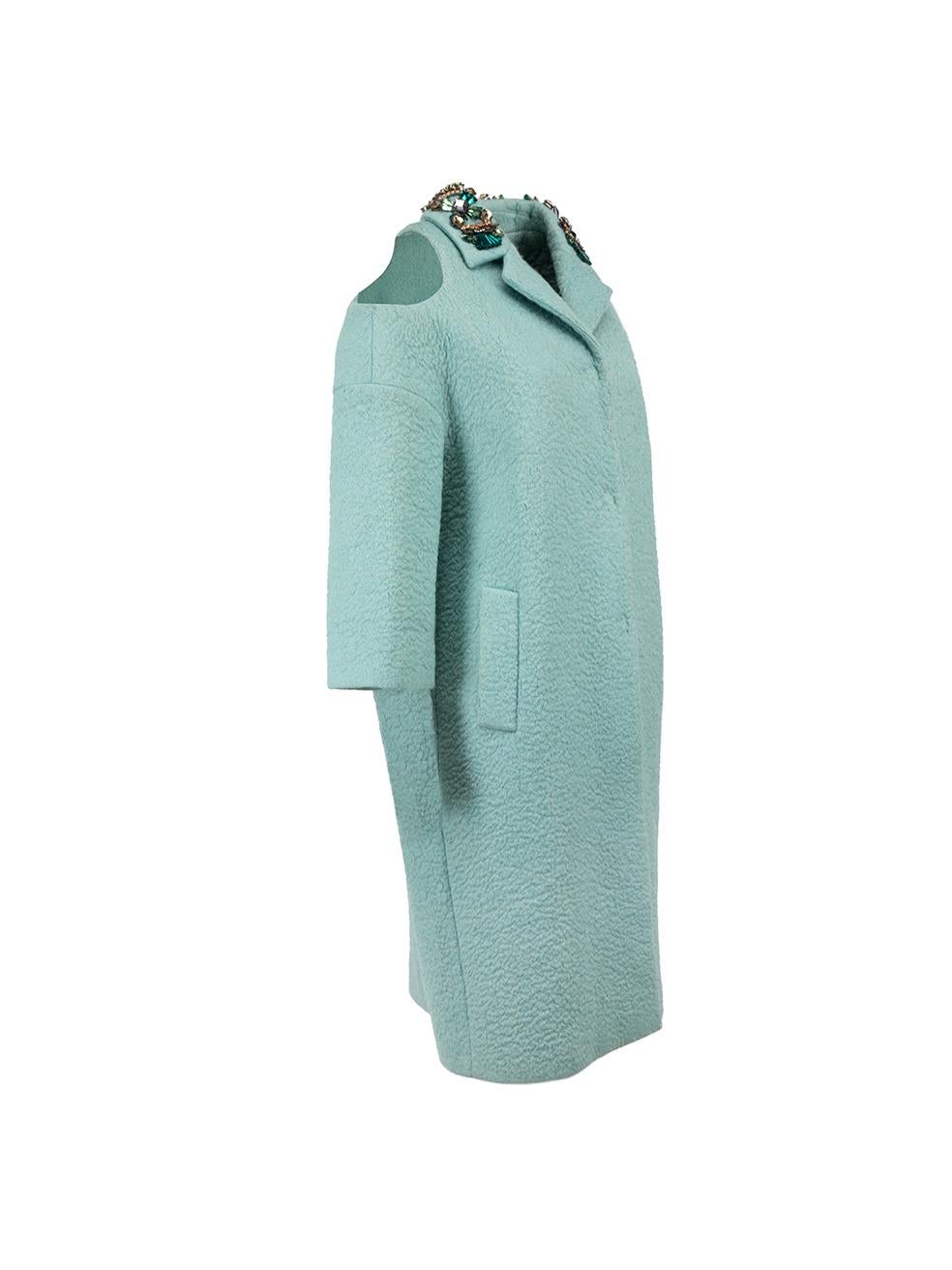 CONDITION is Very good. General wear along interior labels on this used Anya Hindmarch designer resale item. This item comes with garment bags.



Details


Light turquoise

Wool

Long coat

Front snap buttons closure

Cold shoulder