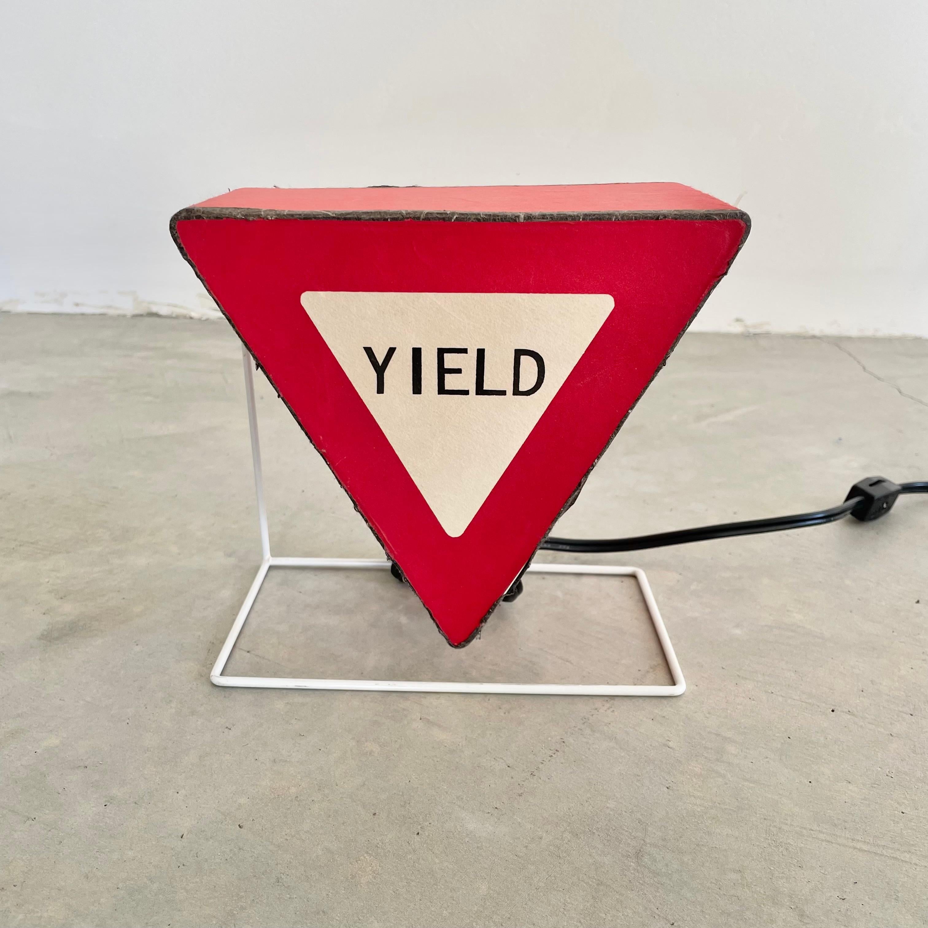 Vintage light up Yield sign with a white wire metal frame and rice paper body. Made with great attention to detail and skill. A very unique piece that illuminates beautifully and has beautiful lines throughout the paper body. Petite piece making it