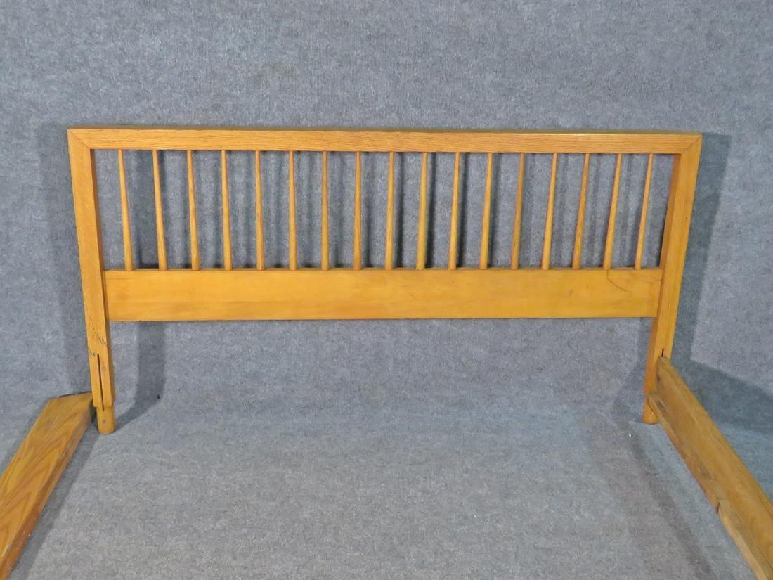 Beautiful vintage bed frame by Raymond Loewy, in a rich light walnut. Perfect for adding elegant and timeless Mid-Century Modern style to any bedroom. Please confirm item location with seller (NY/NJ).