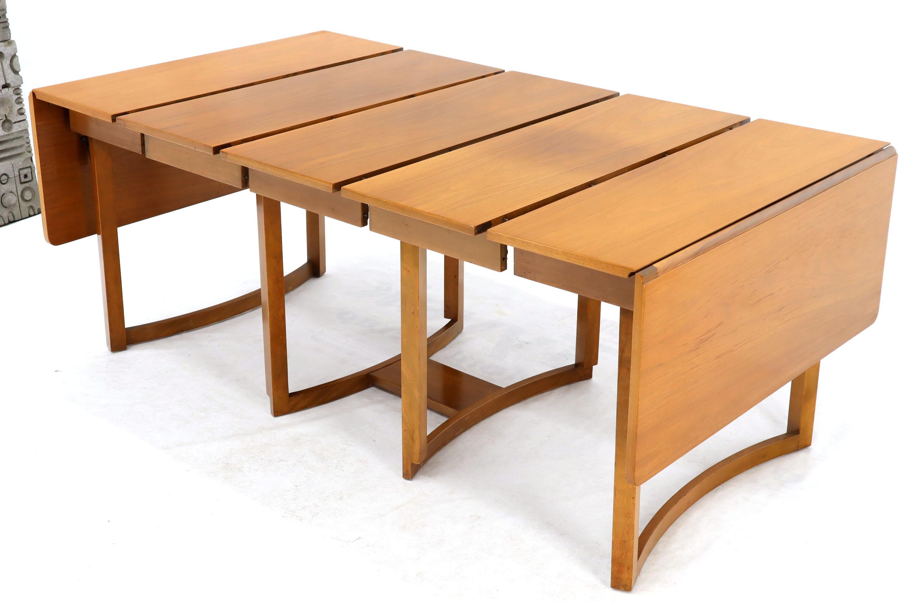Robsjohn Gibbings for Widdicomb mid century modern dining table with beautiful glow light walnut finish. Completely folded measures: 26x40x29