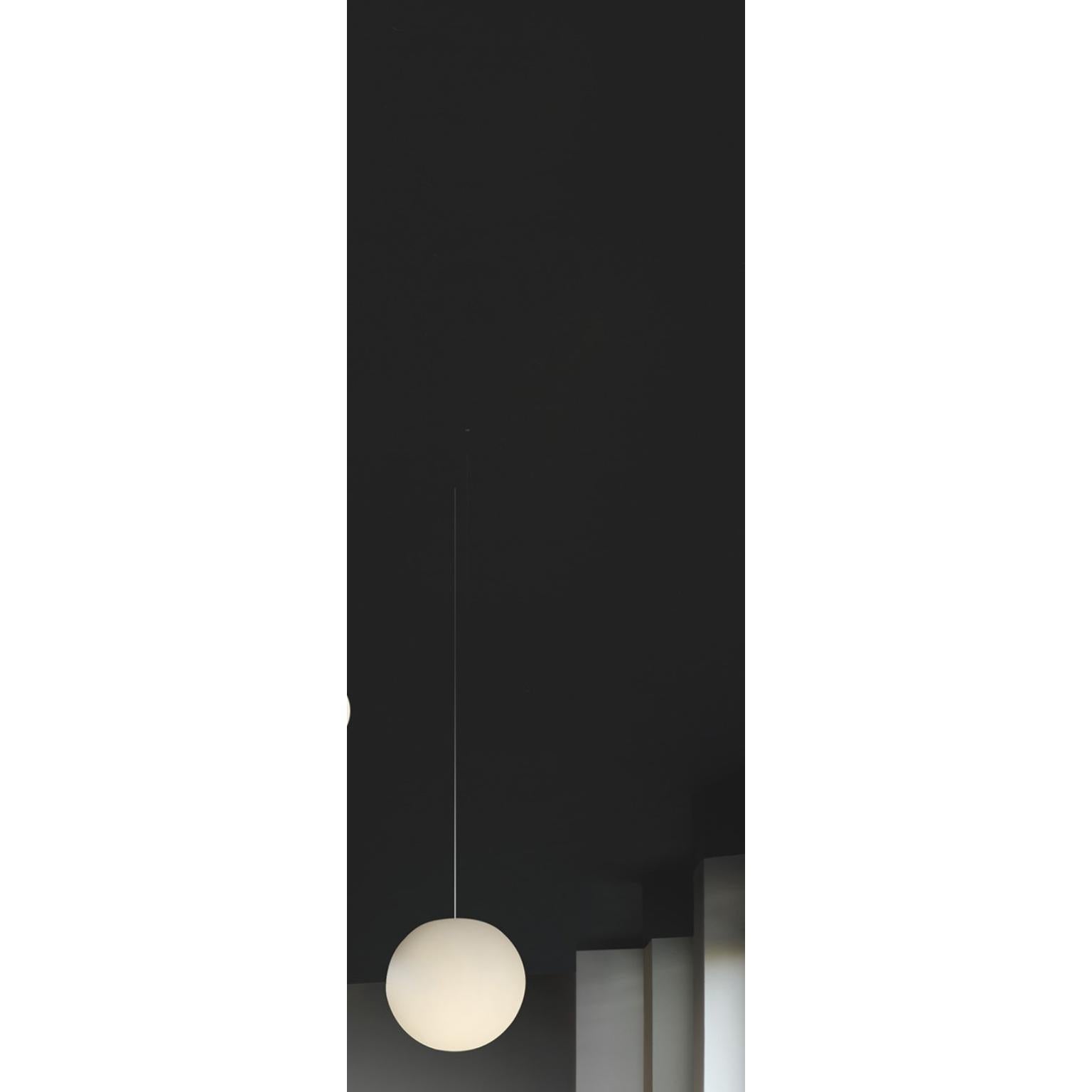 Light White Globo 30 Hanging Lamp by SLIDE Studio
Dimensions: Ø 30 cm.
Materials: Polyethylene.

Available in different sizes. Prices may vary. This product is suitable for indoor and outdoor use. All our lamps can be wired according to each