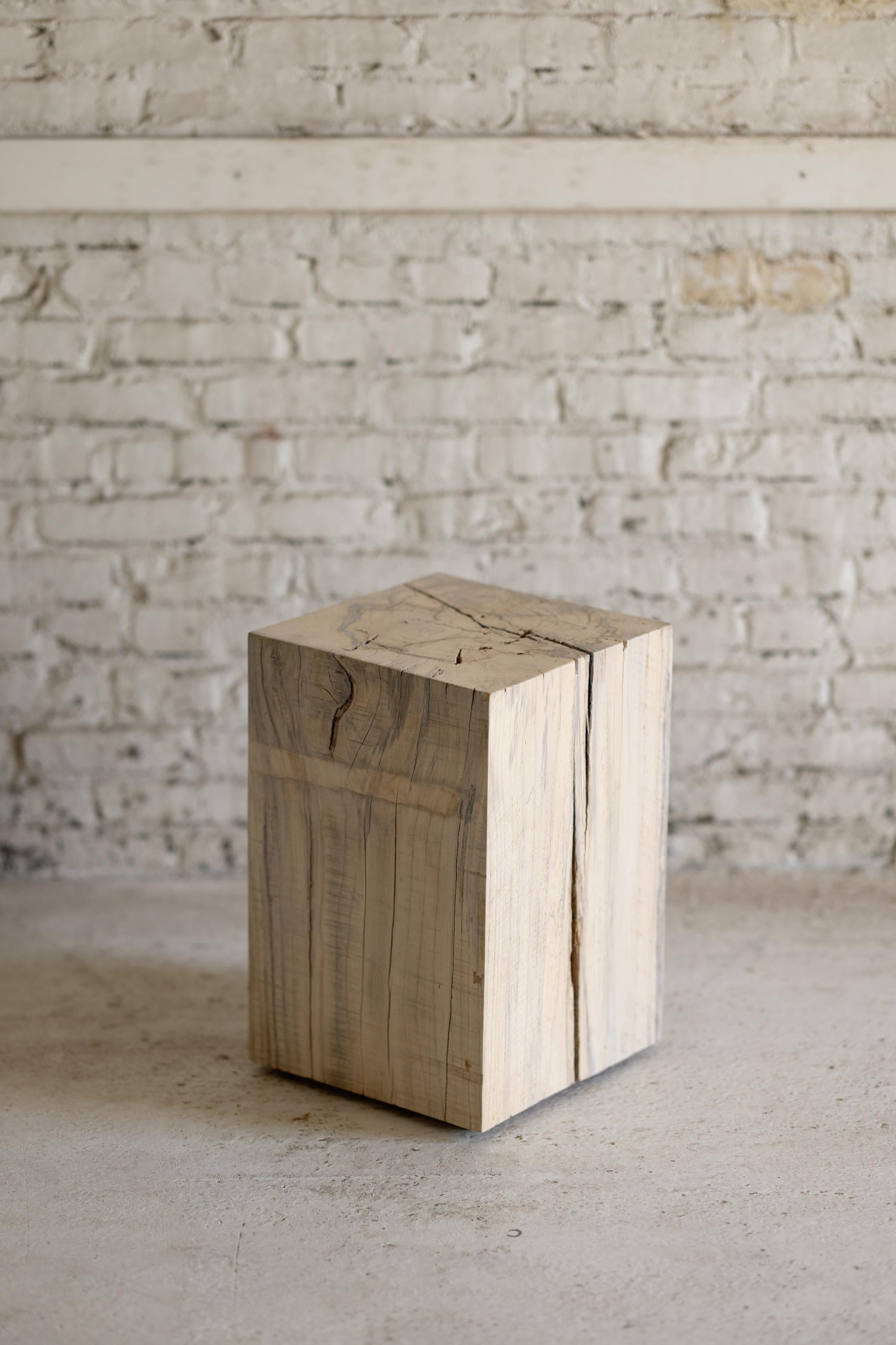 Solidly built using urban wood, the Le Boit Gulf Sand Collection combines rustic appeal with a clean, contemporary design. The unique beauty of urban wood as a solid volume makes a statement as a display for your art piece or personal treasure,